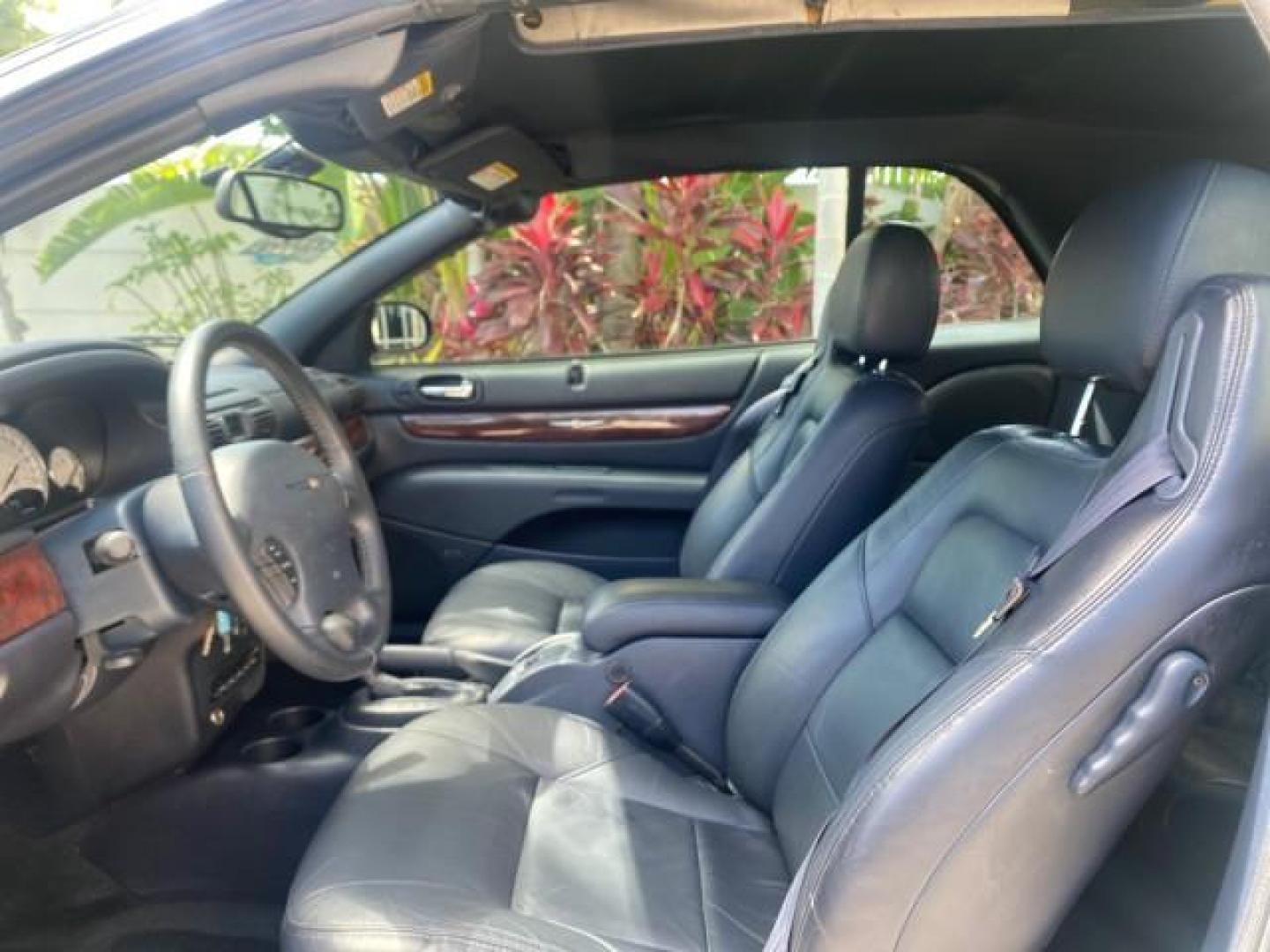 2002 Steel Blue Pearl /Deep Royal Blue Chrysler Sebring Limited 1 OWNER FL LOW MILES 37,932 (1C3EL65RX2N) with an 2.7L MFI DOHC 24-Valve V6 Engine engine, Automatic transmission, located at 4701 North Dixie Hwy, Pompano Beach, FL, 33064, (954) 422-2889, 26.240938, -80.123474 - OUR WEBPAGE FLORIDACARS1.COM HAS OVER 100 PHOTOS AND FREE CARFAX LINK 2002 CHRYSLER SEBRING LIMITED VIN: 1C3EL65RX2N127842 1 C 3 E L 6 5 R X 2 N 1 2 7 8 4 2 CONVERTIBLE 2.7L V6 F DOHC GASOLINE FRONT WHEEL DRIVE Top Features Alloy Wheels Soft Top Infinity Sound System Sunroof(s) Leather Seats Basic F - Photo#35