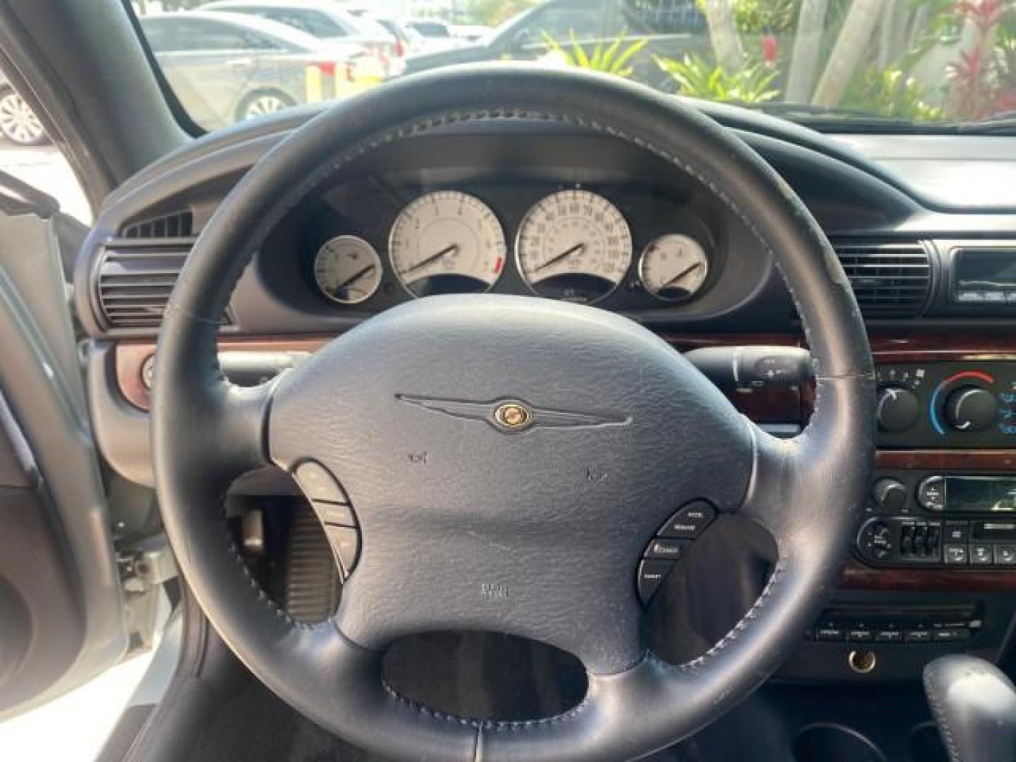 2002 Steel Blue Pearl /Deep Royal Blue Chrysler Sebring Limited 1 OWNER FL LOW MILES 37,932 (1C3EL65RX2N) with an 2.7L MFI DOHC 24-Valve V6 Engine engine, Automatic transmission, located at 4701 North Dixie Hwy, Pompano Beach, FL, 33064, (954) 422-2889, 26.240938, -80.123474 - OUR WEBPAGE FLORIDACARS1.COM HAS OVER 100 PHOTOS AND FREE CARFAX LINK 2002 CHRYSLER SEBRING LIMITED VIN: 1C3EL65RX2N127842 1 C 3 E L 6 5 R X 2 N 1 2 7 8 4 2 CONVERTIBLE 2.7L V6 F DOHC GASOLINE FRONT WHEEL DRIVE Top Features Alloy Wheels Soft Top Infinity Sound System Sunroof(s) Leather Seats Basic F - Photo#38