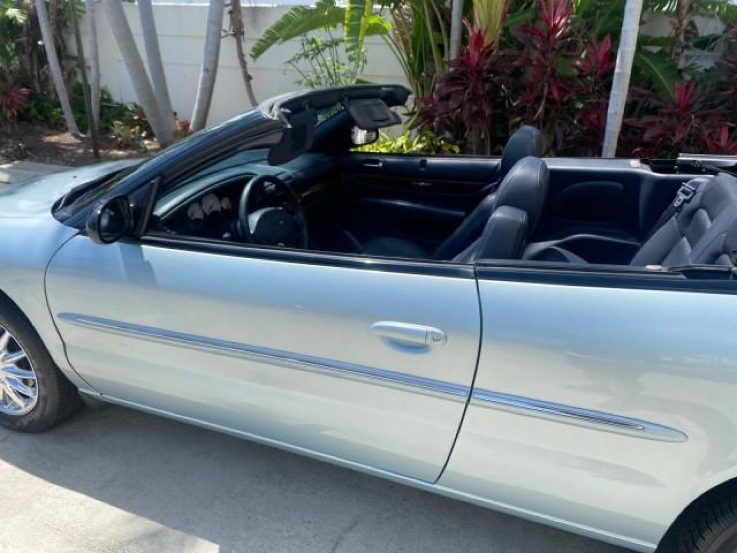 2002 Steel Blue Pearl /Deep Royal Blue Chrysler Sebring Limited 1 OWNER FL LOW MILES 37,932 (1C3EL65RX2N) with an 2.7L MFI DOHC 24-Valve V6 Engine engine, Automatic transmission, located at 4701 North Dixie Hwy, Pompano Beach, FL, 33064, (954) 422-2889, 26.240938, -80.123474 - OUR WEBPAGE FLORIDACARS1.COM HAS OVER 100 PHOTOS AND FREE CARFAX LINK 2002 CHRYSLER SEBRING LIMITED VIN: 1C3EL65RX2N127842 1 C 3 E L 6 5 R X 2 N 1 2 7 8 4 2 CONVERTIBLE 2.7L V6 F DOHC GASOLINE FRONT WHEEL DRIVE Top Features Alloy Wheels Soft Top Infinity Sound System Sunroof(s) Leather Seats Basic F - Photo#58