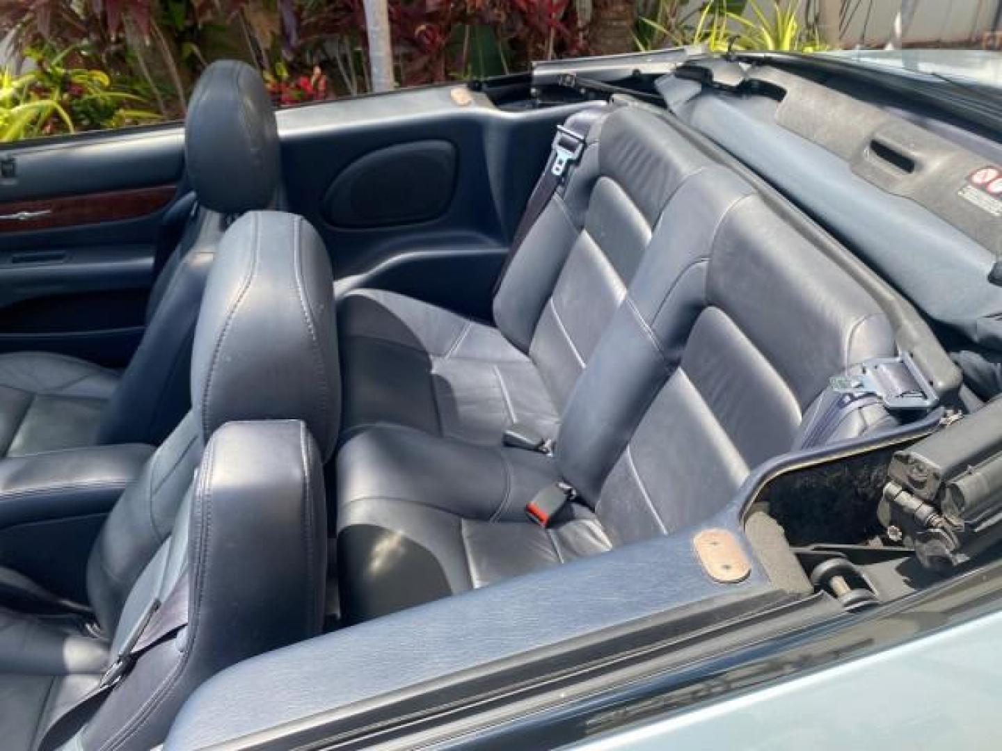 2002 Steel Blue Pearl /Deep Royal Blue Chrysler Sebring Limited 1 OWNER FL LOW MILES 37,932 (1C3EL65RX2N) with an 2.7L MFI DOHC 24-Valve V6 Engine engine, Automatic transmission, located at 4701 North Dixie Hwy, Pompano Beach, FL, 33064, (954) 422-2889, 26.240938, -80.123474 - OUR WEBPAGE FLORIDACARS1.COM HAS OVER 100 PHOTOS AND FREE CARFAX LINK 2002 CHRYSLER SEBRING LIMITED VIN: 1C3EL65RX2N127842 1 C 3 E L 6 5 R X 2 N 1 2 7 8 4 2 CONVERTIBLE 2.7L V6 F DOHC GASOLINE FRONT WHEEL DRIVE Top Features Alloy Wheels Soft Top Infinity Sound System Sunroof(s) Leather Seats Basic F - Photo#60