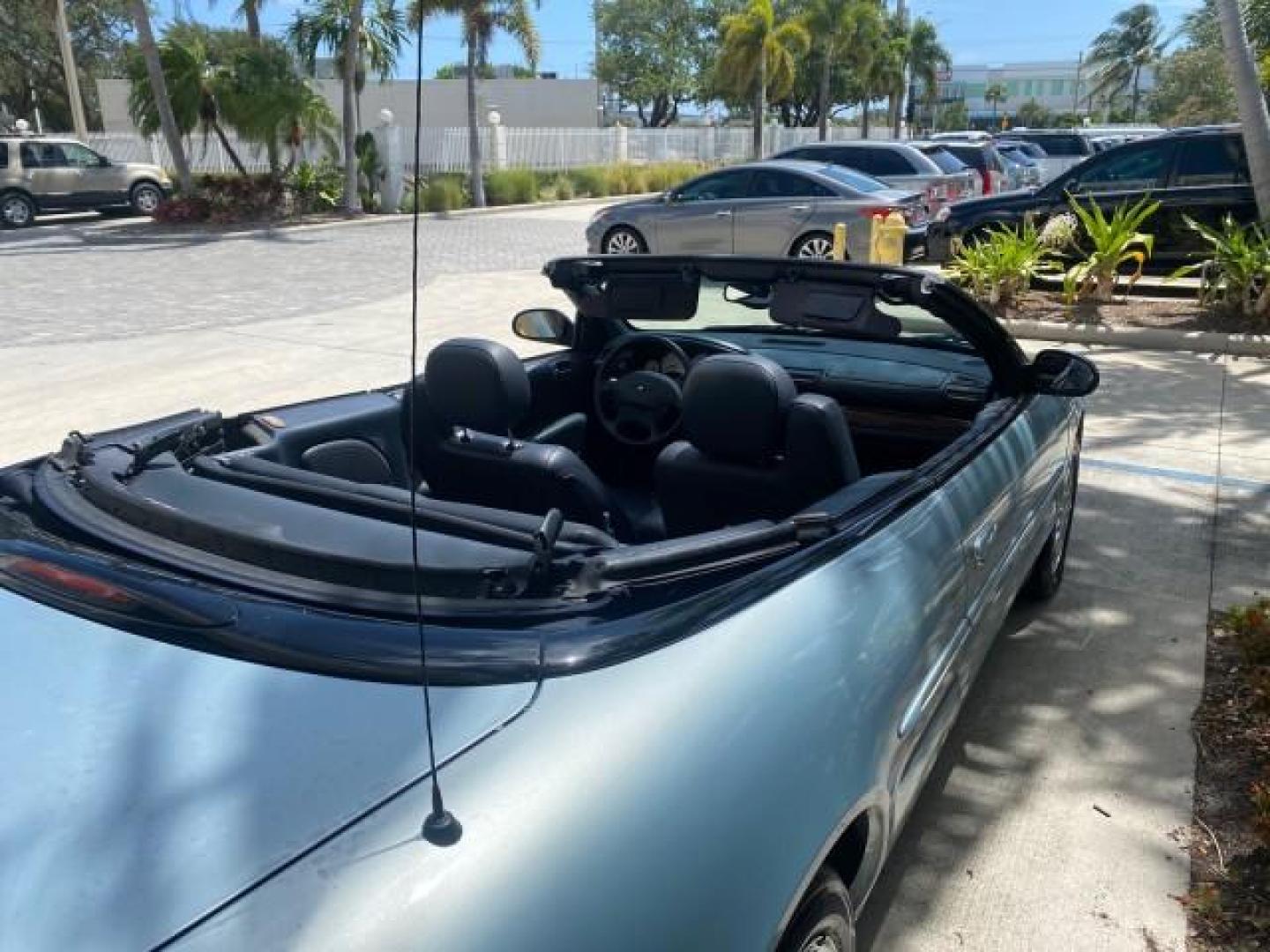 2002 Steel Blue Pearl /Deep Royal Blue Chrysler Sebring Limited 1 OWNER FL LOW MILES 37,932 (1C3EL65RX2N) with an 2.7L MFI DOHC 24-Valve V6 Engine engine, Automatic transmission, located at 4701 North Dixie Hwy, Pompano Beach, FL, 33064, (954) 422-2889, 26.240938, -80.123474 - OUR WEBPAGE FLORIDACARS1.COM HAS OVER 100 PHOTOS AND FREE CARFAX LINK 2002 CHRYSLER SEBRING LIMITED VIN: 1C3EL65RX2N127842 1 C 3 E L 6 5 R X 2 N 1 2 7 8 4 2 CONVERTIBLE 2.7L V6 F DOHC GASOLINE FRONT WHEEL DRIVE Top Features Alloy Wheels Soft Top Infinity Sound System Sunroof(s) Leather Seats Basic F - Photo#77