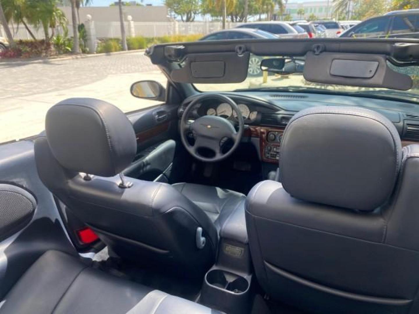 2002 Steel Blue Pearl /Deep Royal Blue Chrysler Sebring Limited 1 OWNER FL LOW MILES 37,932 (1C3EL65RX2N) with an 2.7L MFI DOHC 24-Valve V6 Engine engine, Automatic transmission, located at 4701 North Dixie Hwy, Pompano Beach, FL, 33064, (954) 422-2889, 26.240938, -80.123474 - OUR WEBPAGE FLORIDACARS1.COM HAS OVER 100 PHOTOS AND FREE CARFAX LINK 2002 CHRYSLER SEBRING LIMITED VIN: 1C3EL65RX2N127842 1 C 3 E L 6 5 R X 2 N 1 2 7 8 4 2 CONVERTIBLE 2.7L V6 F DOHC GASOLINE FRONT WHEEL DRIVE Top Features Alloy Wheels Soft Top Infinity Sound System Sunroof(s) Leather Seats Basic F - Photo#82