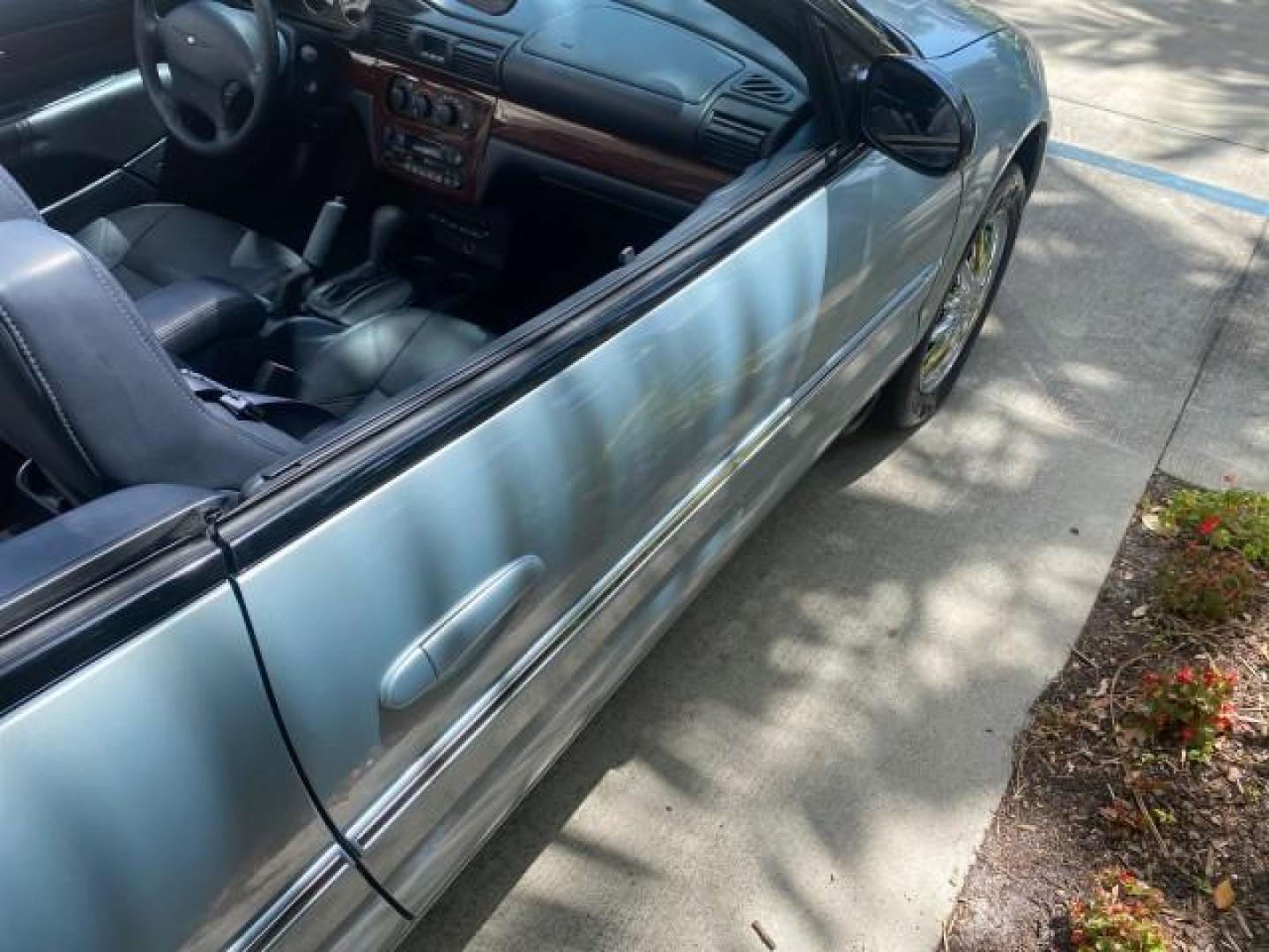 2002 Steel Blue Pearl /Deep Royal Blue Chrysler Sebring Limited 1 OWNER FL LOW MILES 37,932 (1C3EL65RX2N) with an 2.7L MFI DOHC 24-Valve V6 Engine engine, Automatic transmission, located at 4701 North Dixie Hwy, Pompano Beach, FL, 33064, (954) 422-2889, 26.240938, -80.123474 - OUR WEBPAGE FLORIDACARS1.COM HAS OVER 100 PHOTOS AND FREE CARFAX LINK 2002 CHRYSLER SEBRING LIMITED VIN: 1C3EL65RX2N127842 1 C 3 E L 6 5 R X 2 N 1 2 7 8 4 2 CONVERTIBLE 2.7L V6 F DOHC GASOLINE FRONT WHEEL DRIVE Top Features Alloy Wheels Soft Top Infinity Sound System Sunroof(s) Leather Seats Basic F - Photo#84
