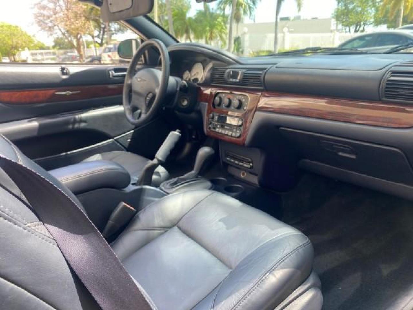 2002 Steel Blue Pearl /Deep Royal Blue Chrysler Sebring Limited 1 OWNER FL LOW MILES 37,932 (1C3EL65RX2N) with an 2.7L MFI DOHC 24-Valve V6 Engine engine, Automatic transmission, located at 4701 North Dixie Hwy, Pompano Beach, FL, 33064, (954) 422-2889, 26.240938, -80.123474 - OUR WEBPAGE FLORIDACARS1.COM HAS OVER 100 PHOTOS AND FREE CARFAX LINK 2002 CHRYSLER SEBRING LIMITED VIN: 1C3EL65RX2N127842 1 C 3 E L 6 5 R X 2 N 1 2 7 8 4 2 CONVERTIBLE 2.7L V6 F DOHC GASOLINE FRONT WHEEL DRIVE Top Features Alloy Wheels Soft Top Infinity Sound System Sunroof(s) Leather Seats Basic F - Photo#87