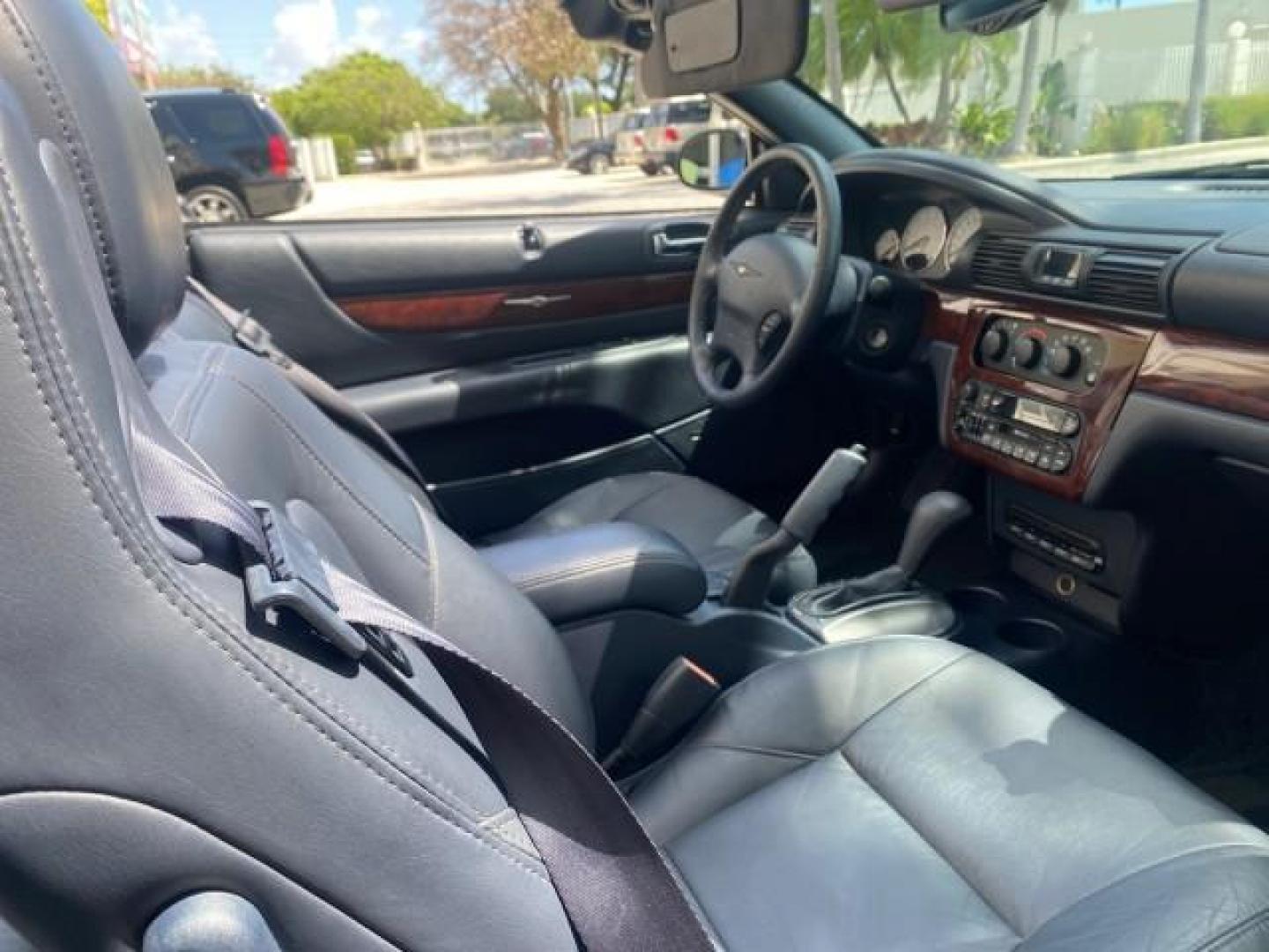 2002 Steel Blue Pearl /Deep Royal Blue Chrysler Sebring Limited 1 OWNER FL LOW MILES 37,932 (1C3EL65RX2N) with an 2.7L MFI DOHC 24-Valve V6 Engine engine, Automatic transmission, located at 4701 North Dixie Hwy, Pompano Beach, FL, 33064, (954) 422-2889, 26.240938, -80.123474 - OUR WEBPAGE FLORIDACARS1.COM HAS OVER 100 PHOTOS AND FREE CARFAX LINK 2002 CHRYSLER SEBRING LIMITED VIN: 1C3EL65RX2N127842 1 C 3 E L 6 5 R X 2 N 1 2 7 8 4 2 CONVERTIBLE 2.7L V6 F DOHC GASOLINE FRONT WHEEL DRIVE Top Features Alloy Wheels Soft Top Infinity Sound System Sunroof(s) Leather Seats Basic F - Photo#88