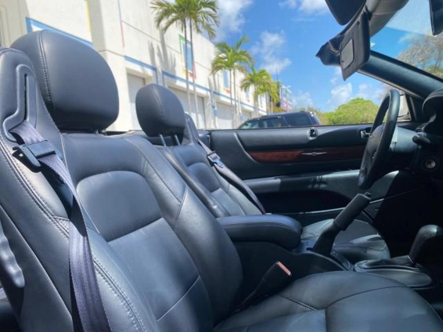 2002 Steel Blue Pearl /Deep Royal Blue Chrysler Sebring Limited 1 OWNER FL LOW MILES 37,932 (1C3EL65RX2N) with an 2.7L MFI DOHC 24-Valve V6 Engine engine, Automatic transmission, located at 4701 North Dixie Hwy, Pompano Beach, FL, 33064, (954) 422-2889, 26.240938, -80.123474 - OUR WEBPAGE FLORIDACARS1.COM HAS OVER 100 PHOTOS AND FREE CARFAX LINK 2002 CHRYSLER SEBRING LIMITED VIN: 1C3EL65RX2N127842 1 C 3 E L 6 5 R X 2 N 1 2 7 8 4 2 CONVERTIBLE 2.7L V6 F DOHC GASOLINE FRONT WHEEL DRIVE Top Features Alloy Wheels Soft Top Infinity Sound System Sunroof(s) Leather Seats Basic F - Photo#89