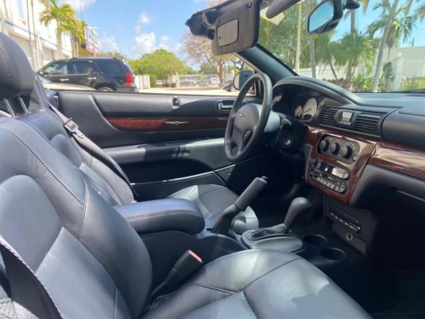 2002 Steel Blue Pearl /Deep Royal Blue Chrysler Sebring Limited 1 OWNER FL LOW MILES 37,932 (1C3EL65RX2N) with an 2.7L MFI DOHC 24-Valve V6 Engine engine, Automatic transmission, located at 4701 North Dixie Hwy, Pompano Beach, FL, 33064, (954) 422-2889, 26.240938, -80.123474 - OUR WEBPAGE FLORIDACARS1.COM HAS OVER 100 PHOTOS AND FREE CARFAX LINK 2002 CHRYSLER SEBRING LIMITED VIN: 1C3EL65RX2N127842 1 C 3 E L 6 5 R X 2 N 1 2 7 8 4 2 CONVERTIBLE 2.7L V6 F DOHC GASOLINE FRONT WHEEL DRIVE Top Features Alloy Wheels Soft Top Infinity Sound System Sunroof(s) Leather Seats Basic F - Photo#90
