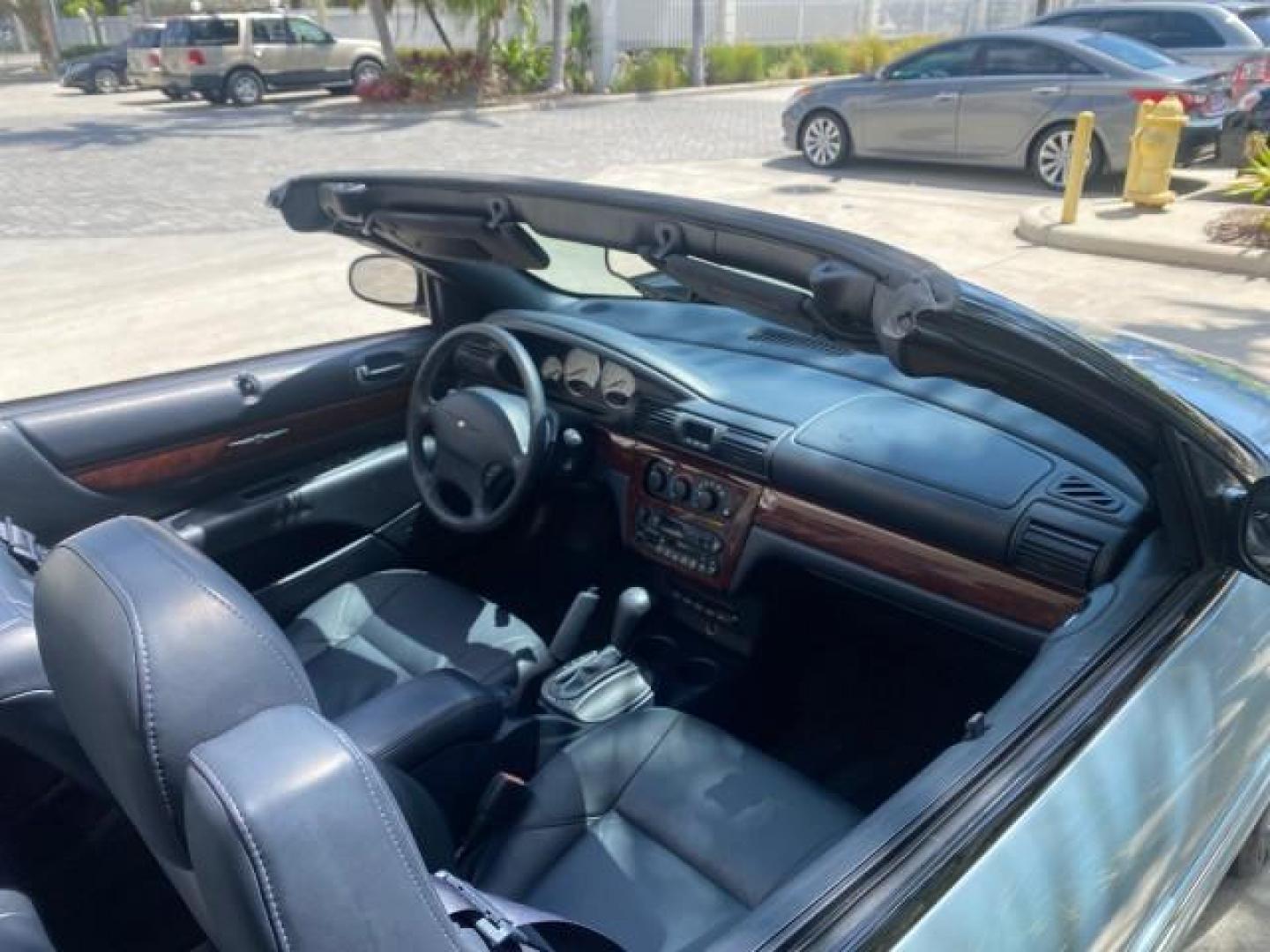 2002 Steel Blue Pearl /Deep Royal Blue Chrysler Sebring Limited 1 OWNER FL LOW MILES 37,932 (1C3EL65RX2N) with an 2.7L MFI DOHC 24-Valve V6 Engine engine, Automatic transmission, located at 4701 North Dixie Hwy, Pompano Beach, FL, 33064, (954) 422-2889, 26.240938, -80.123474 - OUR WEBPAGE FLORIDACARS1.COM HAS OVER 100 PHOTOS AND FREE CARFAX LINK 2002 CHRYSLER SEBRING LIMITED VIN: 1C3EL65RX2N127842 1 C 3 E L 6 5 R X 2 N 1 2 7 8 4 2 CONVERTIBLE 2.7L V6 F DOHC GASOLINE FRONT WHEEL DRIVE Top Features Alloy Wheels Soft Top Infinity Sound System Sunroof(s) Leather Seats Basic F - Photo#93