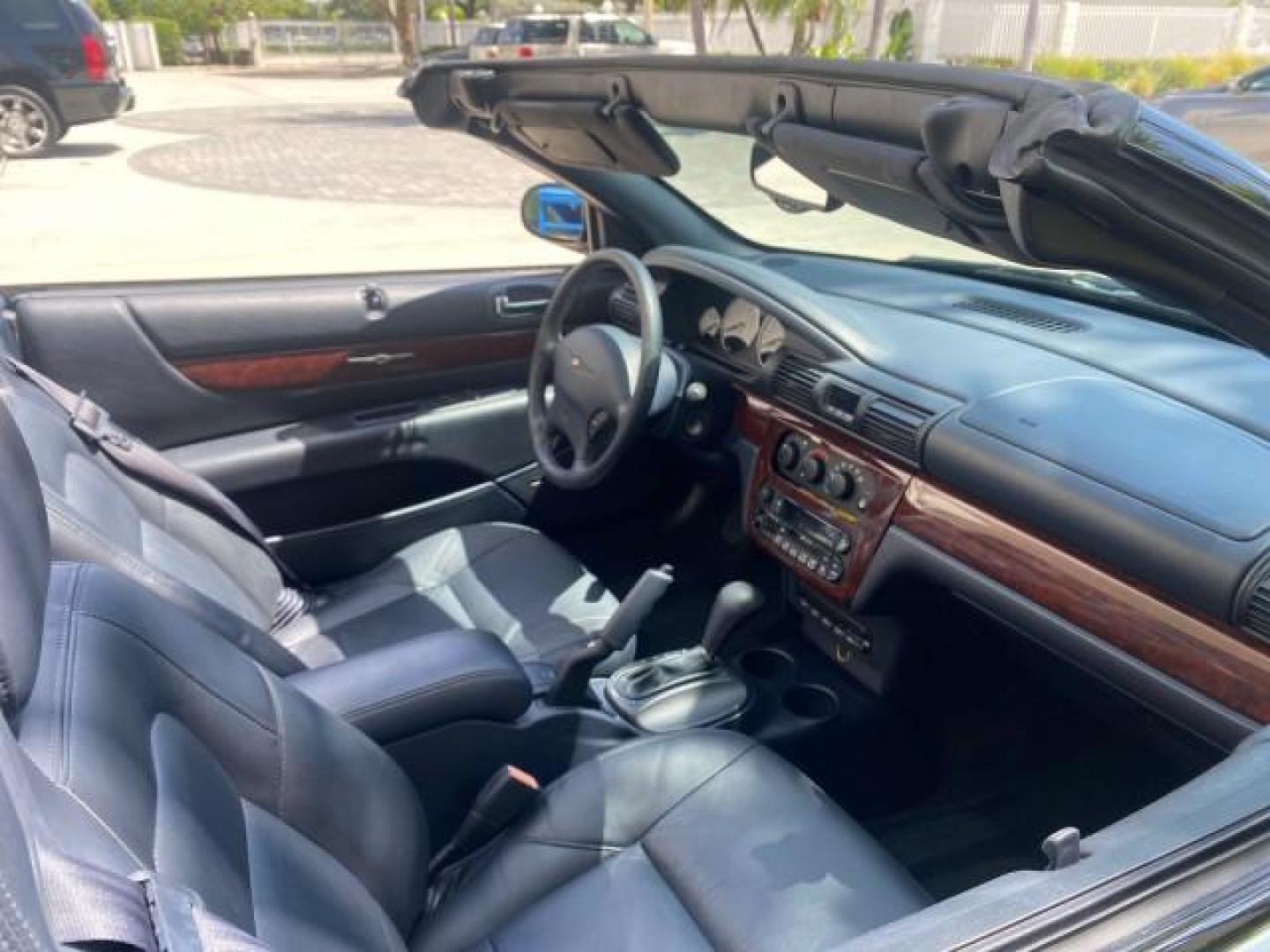 2002 Steel Blue Pearl /Deep Royal Blue Chrysler Sebring Limited 1 OWNER FL LOW MILES 37,932 (1C3EL65RX2N) with an 2.7L MFI DOHC 24-Valve V6 Engine engine, Automatic transmission, located at 4701 North Dixie Hwy, Pompano Beach, FL, 33064, (954) 422-2889, 26.240938, -80.123474 - OUR WEBPAGE FLORIDACARS1.COM HAS OVER 100 PHOTOS AND FREE CARFAX LINK 2002 CHRYSLER SEBRING LIMITED VIN: 1C3EL65RX2N127842 1 C 3 E L 6 5 R X 2 N 1 2 7 8 4 2 CONVERTIBLE 2.7L V6 F DOHC GASOLINE FRONT WHEEL DRIVE Top Features Alloy Wheels Soft Top Infinity Sound System Sunroof(s) Leather Seats Basic F - Photo#94