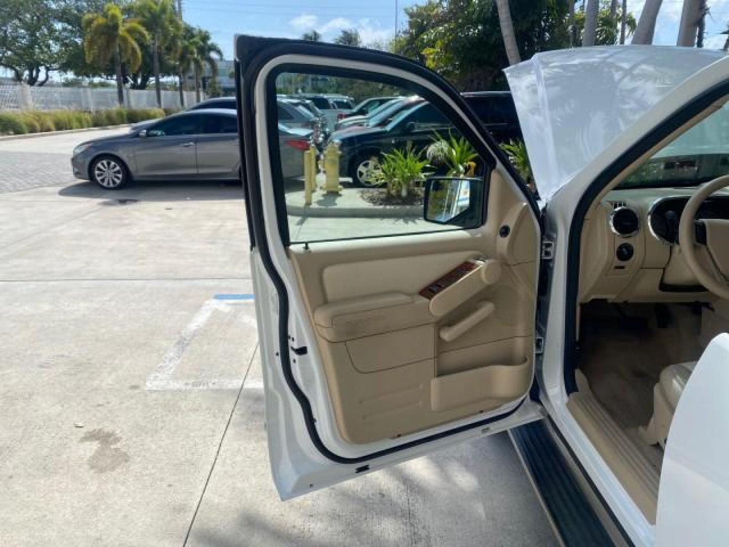 2006 Oxford White /Camel Ford Explorer Eddie Bauer 1 OWNER LOW MILES 88,841 (1FMEU64E56U) with an 4.0L SOHC V6 Engine engine, Automatic transmission, located at 4701 North Dixie Hwy, Pompano Beach, FL, 33064, (954) 422-2889, 26.240938, -80.123474 - OUR WEBPAGE FLORIDACARS1.COM HAS OVER 100 PHOTOS AND FREE CARFAX LINK 2006 FORD EXPLORER EDDIE BAUER VIN: 1FMEU64E56UA54894 1 F M E U 6 4 E 5 6 U A 5 4 8 9 4 4 DOOR WAGON/SPORT UTILITY 4.0L V6 F SOHC GASOLINE REAR WHEEL DRIVE Top Features Alloy Wheels Running Boards Leather Seats Sunroof(s) Parking - Photo#9