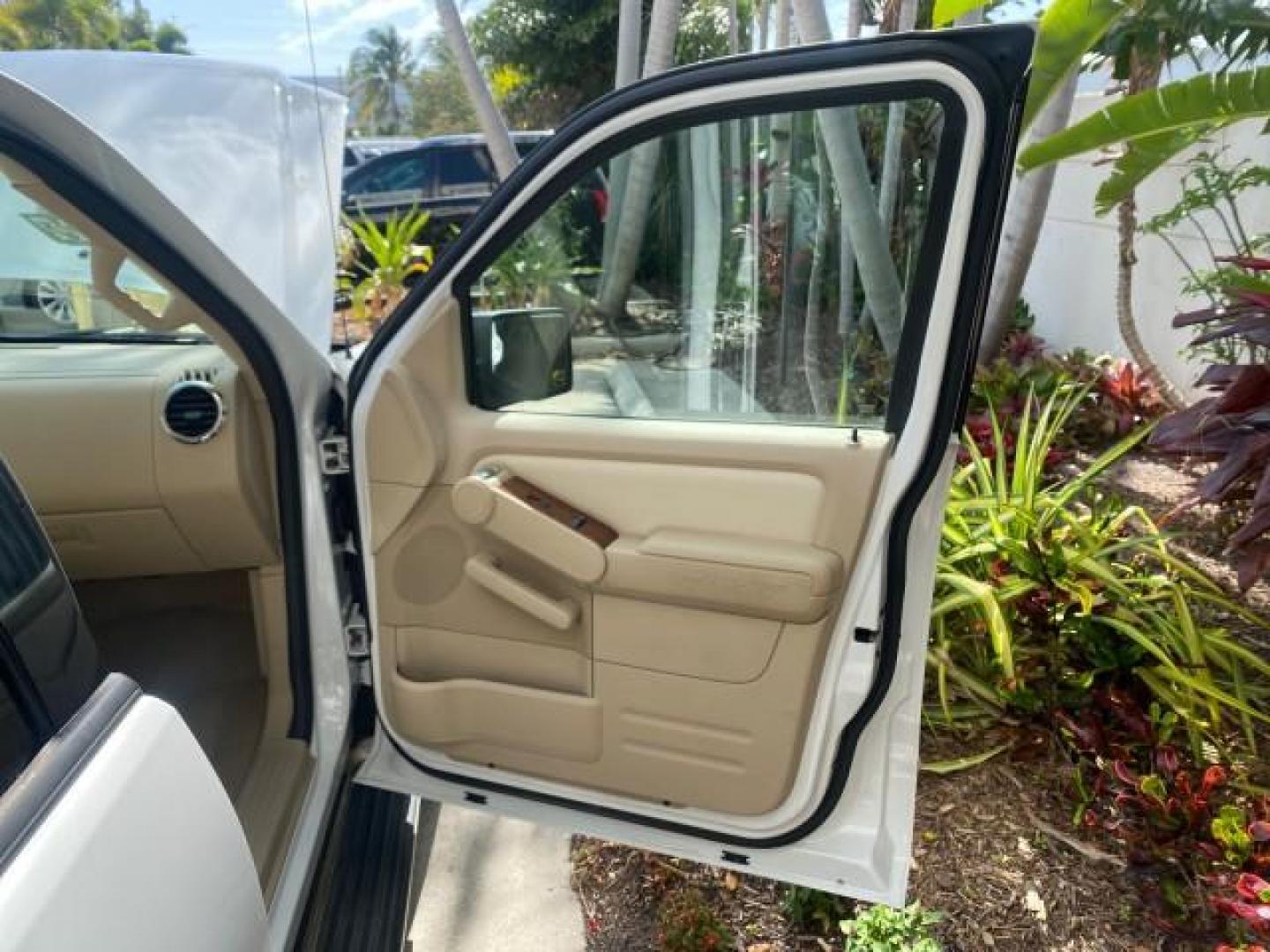 2006 Oxford White /Camel Ford Explorer Eddie Bauer 1 OWNER LOW MILES 88,841 (1FMEU64E56U) with an 4.0L SOHC V6 Engine engine, Automatic transmission, located at 4701 North Dixie Hwy, Pompano Beach, FL, 33064, (954) 422-2889, 26.240938, -80.123474 - OUR WEBPAGE FLORIDACARS1.COM HAS OVER 100 PHOTOS AND FREE CARFAX LINK 2006 FORD EXPLORER EDDIE BAUER VIN: 1FMEU64E56UA54894 1 F M E U 6 4 E 5 6 U A 5 4 8 9 4 4 DOOR WAGON/SPORT UTILITY 4.0L V6 F SOHC GASOLINE REAR WHEEL DRIVE Top Features Alloy Wheels Running Boards Leather Seats Sunroof(s) Parking - Photo#11