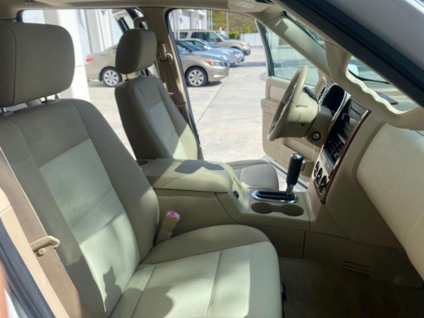 2006 Oxford White /Camel Ford Explorer Eddie Bauer 1 OWNER LOW MILES 88,841 (1FMEU64E56U) with an 4.0L SOHC V6 Engine engine, Automatic transmission, located at 4701 North Dixie Hwy, Pompano Beach, FL, 33064, (954) 422-2889, 26.240938, -80.123474 - OUR WEBPAGE FLORIDACARS1.COM HAS OVER 100 PHOTOS AND FREE CARFAX LINK 2006 FORD EXPLORER EDDIE BAUER VIN: 1FMEU64E56UA54894 1 F M E U 6 4 E 5 6 U A 5 4 8 9 4 4 DOOR WAGON/SPORT UTILITY 4.0L V6 F SOHC GASOLINE REAR WHEEL DRIVE Top Features Alloy Wheels Running Boards Leather Seats Sunroof(s) Parking - Photo#12