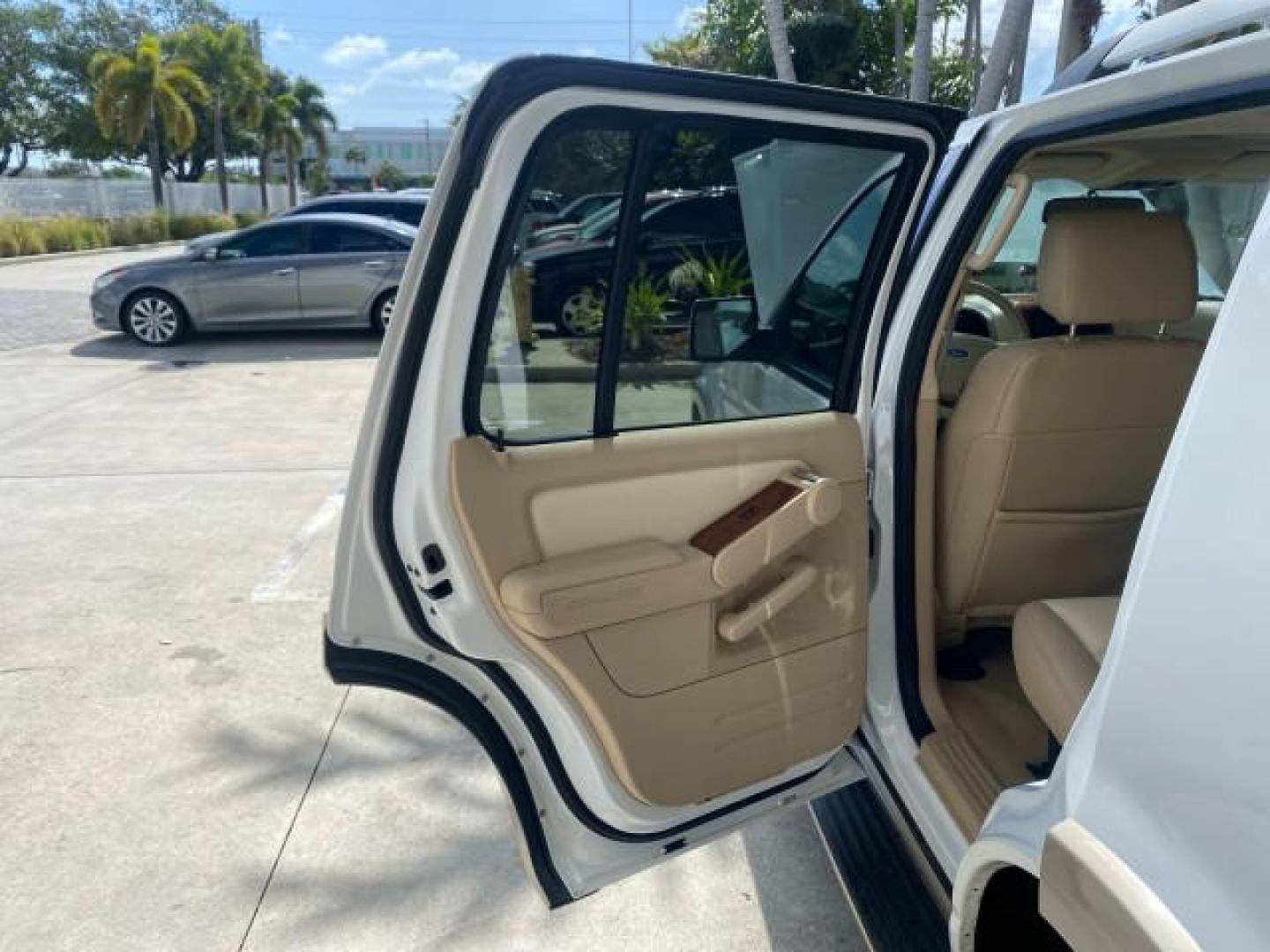 2006 Oxford White /Camel Ford Explorer Eddie Bauer 1 OWNER LOW MILES 88,841 (1FMEU64E56U) with an 4.0L SOHC V6 Engine engine, Automatic transmission, located at 4701 North Dixie Hwy, Pompano Beach, FL, 33064, (954) 422-2889, 26.240938, -80.123474 - OUR WEBPAGE FLORIDACARS1.COM HAS OVER 100 PHOTOS AND FREE CARFAX LINK 2006 FORD EXPLORER EDDIE BAUER VIN: 1FMEU64E56UA54894 1 F M E U 6 4 E 5 6 U A 5 4 8 9 4 4 DOOR WAGON/SPORT UTILITY 4.0L V6 F SOHC GASOLINE REAR WHEEL DRIVE Top Features Alloy Wheels Running Boards Leather Seats Sunroof(s) Parking - Photo#13