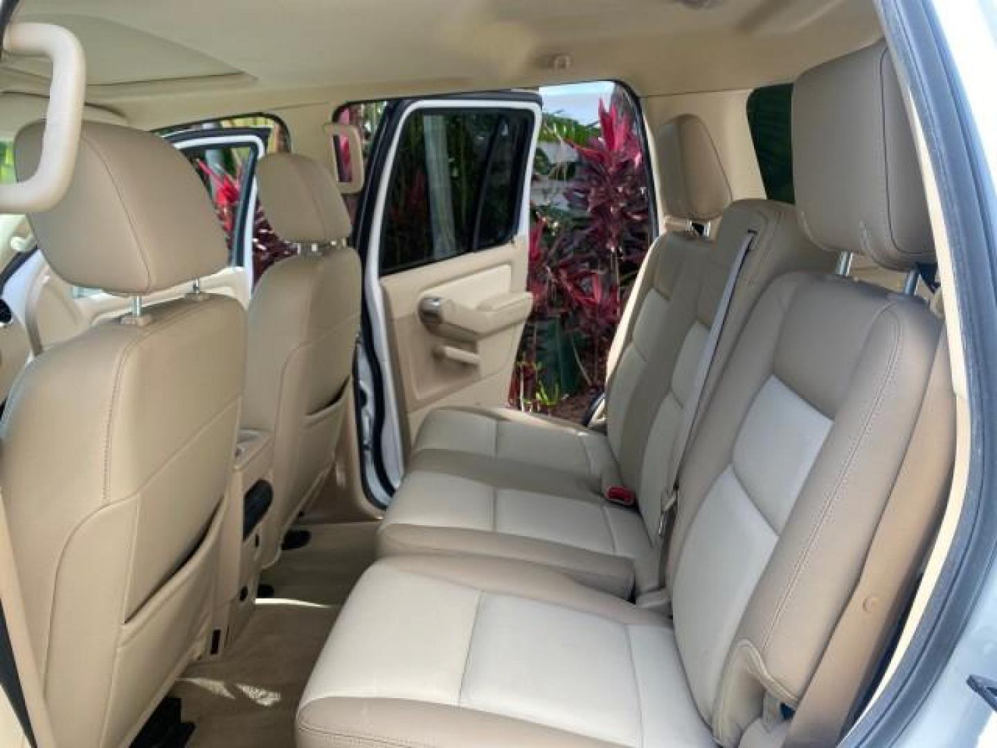 2006 Oxford White /Camel Ford Explorer Eddie Bauer 1 OWNER LOW MILES 88,841 (1FMEU64E56U) with an 4.0L SOHC V6 Engine engine, Automatic transmission, located at 4701 North Dixie Hwy, Pompano Beach, FL, 33064, (954) 422-2889, 26.240938, -80.123474 - OUR WEBPAGE FLORIDACARS1.COM HAS OVER 100 PHOTOS AND FREE CARFAX LINK 2006 FORD EXPLORER EDDIE BAUER VIN: 1FMEU64E56UA54894 1 F M E U 6 4 E 5 6 U A 5 4 8 9 4 4 DOOR WAGON/SPORT UTILITY 4.0L V6 F SOHC GASOLINE REAR WHEEL DRIVE Top Features Alloy Wheels Running Boards Leather Seats Sunroof(s) Parking - Photo#14