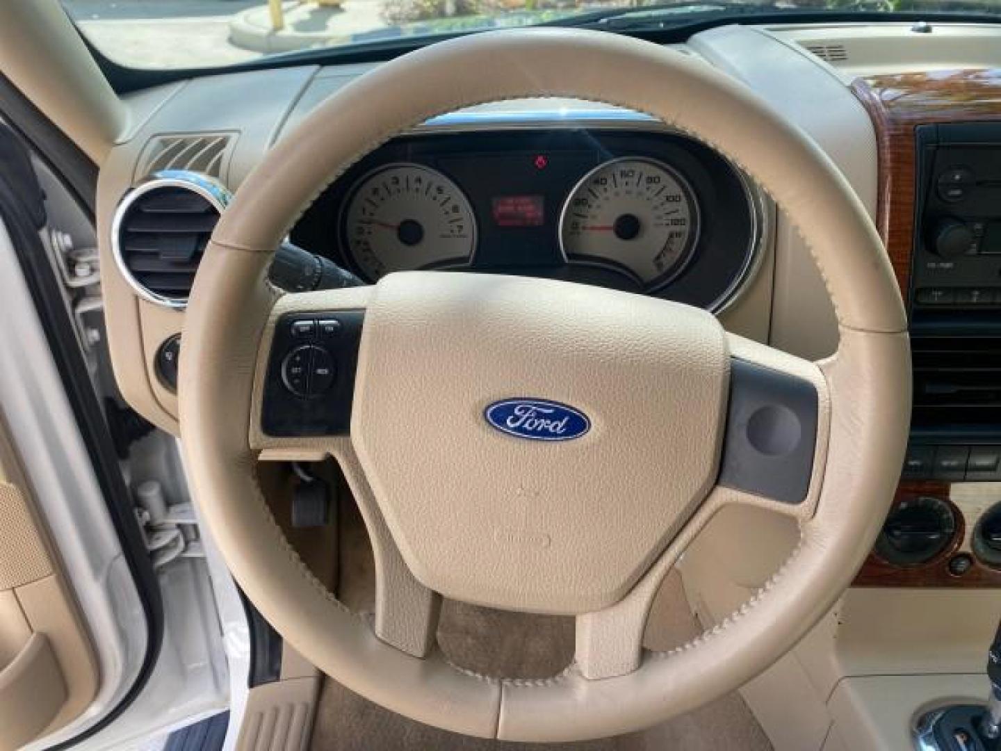 2006 Oxford White /Camel Ford Explorer Eddie Bauer 1 OWNER LOW MILES 88,841 (1FMEU64E56U) with an 4.0L SOHC V6 Engine engine, Automatic transmission, located at 4701 North Dixie Hwy, Pompano Beach, FL, 33064, (954) 422-2889, 26.240938, -80.123474 - OUR WEBPAGE FLORIDACARS1.COM HAS OVER 100 PHOTOS AND FREE CARFAX LINK 2006 FORD EXPLORER EDDIE BAUER VIN: 1FMEU64E56UA54894 1 F M E U 6 4 E 5 6 U A 5 4 8 9 4 4 DOOR WAGON/SPORT UTILITY 4.0L V6 F SOHC GASOLINE REAR WHEEL DRIVE Top Features Alloy Wheels Running Boards Leather Seats Sunroof(s) Parking - Photo#38