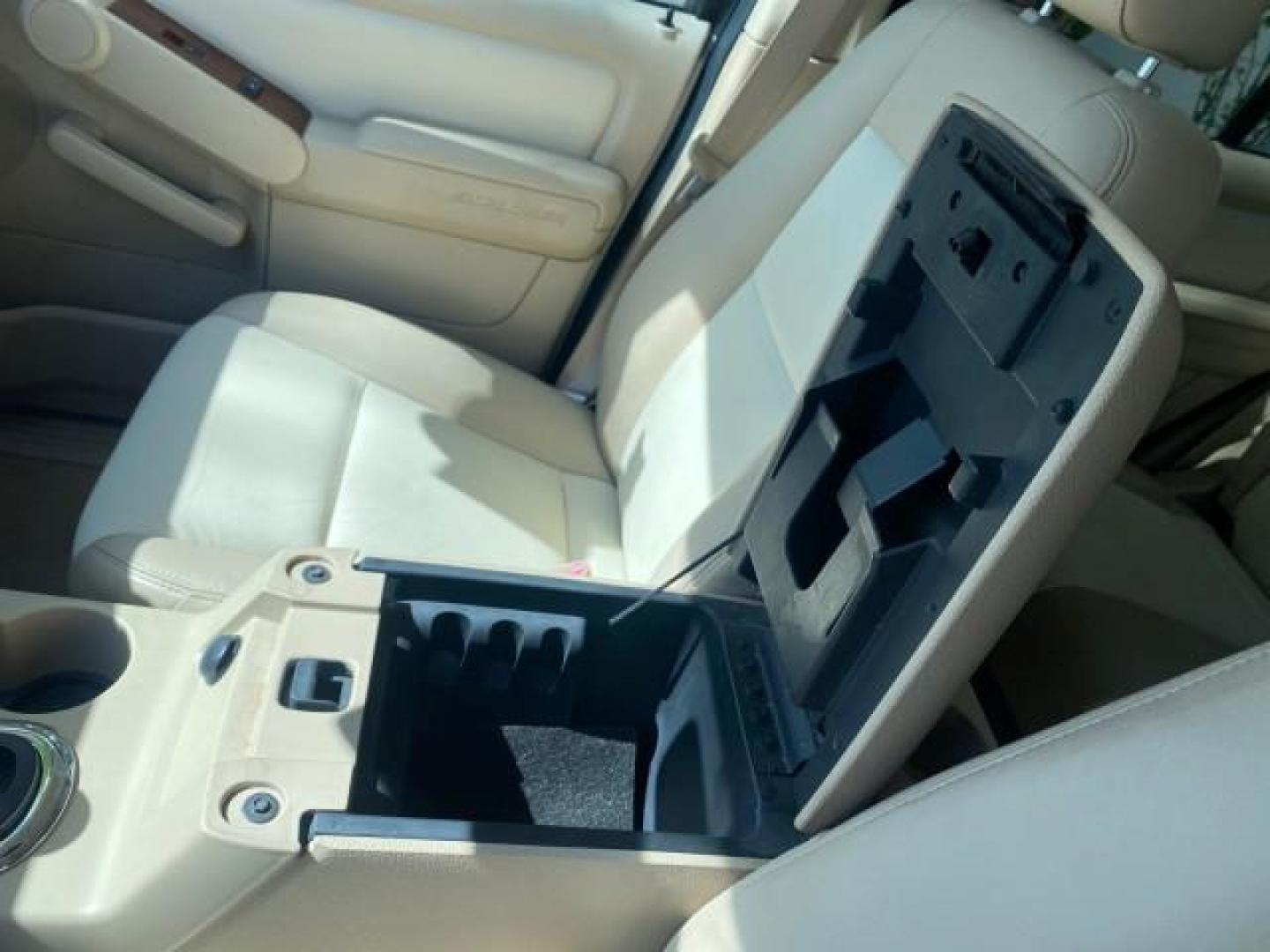 2006 Oxford White /Camel Ford Explorer Eddie Bauer 1 OWNER LOW MILES 88,841 (1FMEU64E56U) with an 4.0L SOHC V6 Engine engine, Automatic transmission, located at 4701 North Dixie Hwy, Pompano Beach, FL, 33064, (954) 422-2889, 26.240938, -80.123474 - OUR WEBPAGE FLORIDACARS1.COM HAS OVER 100 PHOTOS AND FREE CARFAX LINK 2006 FORD EXPLORER EDDIE BAUER VIN: 1FMEU64E56UA54894 1 F M E U 6 4 E 5 6 U A 5 4 8 9 4 4 DOOR WAGON/SPORT UTILITY 4.0L V6 F SOHC GASOLINE REAR WHEEL DRIVE Top Features Alloy Wheels Running Boards Leather Seats Sunroof(s) Parking - Photo#48