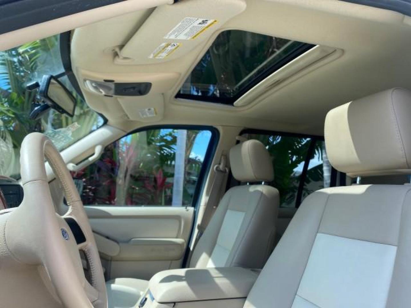 2006 Oxford White /Camel Ford Explorer Eddie Bauer 1 OWNER LOW MILES 88,841 (1FMEU64E56U) with an 4.0L SOHC V6 Engine engine, Automatic transmission, located at 4701 North Dixie Hwy, Pompano Beach, FL, 33064, (954) 422-2889, 26.240938, -80.123474 - OUR WEBPAGE FLORIDACARS1.COM HAS OVER 100 PHOTOS AND FREE CARFAX LINK 2006 FORD EXPLORER EDDIE BAUER VIN: 1FMEU64E56UA54894 1 F M E U 6 4 E 5 6 U A 5 4 8 9 4 4 DOOR WAGON/SPORT UTILITY 4.0L V6 F SOHC GASOLINE REAR WHEEL DRIVE Top Features Alloy Wheels Running Boards Leather Seats Sunroof(s) Parking - Photo#55