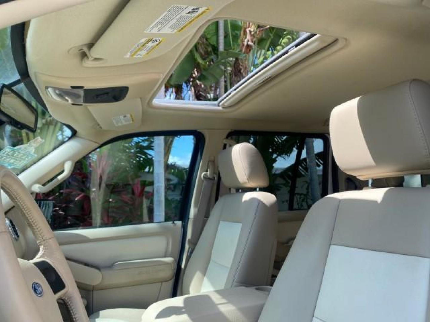 2006 Oxford White /Camel Ford Explorer Eddie Bauer 1 OWNER LOW MILES 88,841 (1FMEU64E56U) with an 4.0L SOHC V6 Engine engine, Automatic transmission, located at 4701 North Dixie Hwy, Pompano Beach, FL, 33064, (954) 422-2889, 26.240938, -80.123474 - OUR WEBPAGE FLORIDACARS1.COM HAS OVER 100 PHOTOS AND FREE CARFAX LINK 2006 FORD EXPLORER EDDIE BAUER VIN: 1FMEU64E56UA54894 1 F M E U 6 4 E 5 6 U A 5 4 8 9 4 4 DOOR WAGON/SPORT UTILITY 4.0L V6 F SOHC GASOLINE REAR WHEEL DRIVE Top Features Alloy Wheels Running Boards Leather Seats Sunroof(s) Parking - Photo#56