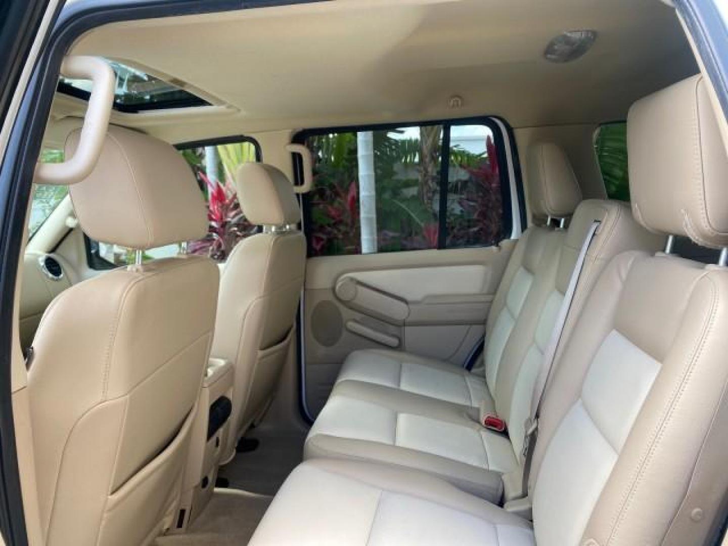 2006 Oxford White /Camel Ford Explorer Eddie Bauer 1 OWNER LOW MILES 88,841 (1FMEU64E56U) with an 4.0L SOHC V6 Engine engine, Automatic transmission, located at 4701 North Dixie Hwy, Pompano Beach, FL, 33064, (954) 422-2889, 26.240938, -80.123474 - OUR WEBPAGE FLORIDACARS1.COM HAS OVER 100 PHOTOS AND FREE CARFAX LINK 2006 FORD EXPLORER EDDIE BAUER VIN: 1FMEU64E56UA54894 1 F M E U 6 4 E 5 6 U A 5 4 8 9 4 4 DOOR WAGON/SPORT UTILITY 4.0L V6 F SOHC GASOLINE REAR WHEEL DRIVE Top Features Alloy Wheels Running Boards Leather Seats Sunroof(s) Parking - Photo#62