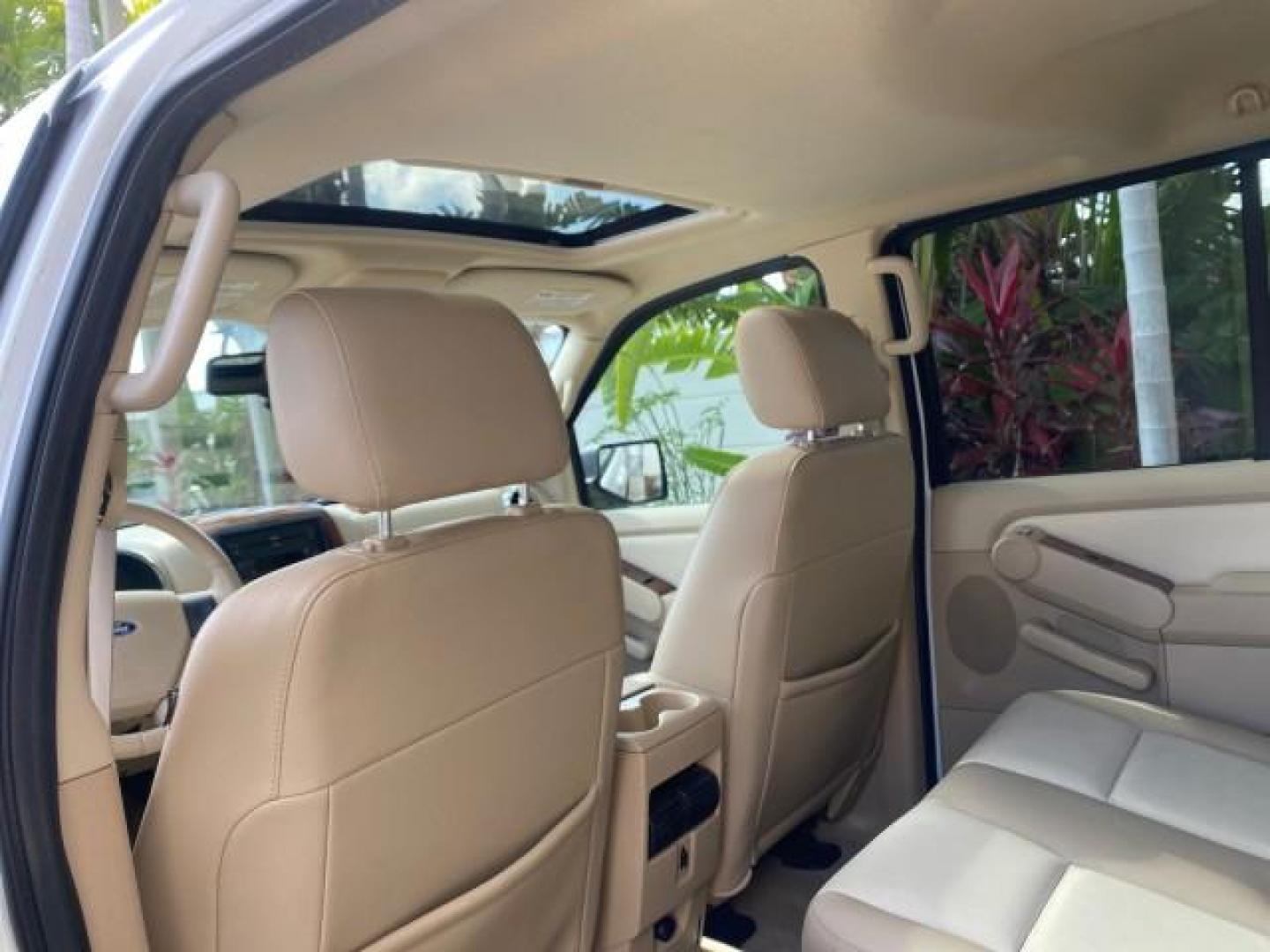 2006 Oxford White /Camel Ford Explorer Eddie Bauer 1 OWNER LOW MILES 88,841 (1FMEU64E56U) with an 4.0L SOHC V6 Engine engine, Automatic transmission, located at 4701 North Dixie Hwy, Pompano Beach, FL, 33064, (954) 422-2889, 26.240938, -80.123474 - OUR WEBPAGE FLORIDACARS1.COM HAS OVER 100 PHOTOS AND FREE CARFAX LINK 2006 FORD EXPLORER EDDIE BAUER VIN: 1FMEU64E56UA54894 1 F M E U 6 4 E 5 6 U A 5 4 8 9 4 4 DOOR WAGON/SPORT UTILITY 4.0L V6 F SOHC GASOLINE REAR WHEEL DRIVE Top Features Alloy Wheels Running Boards Leather Seats Sunroof(s) Parking - Photo#63