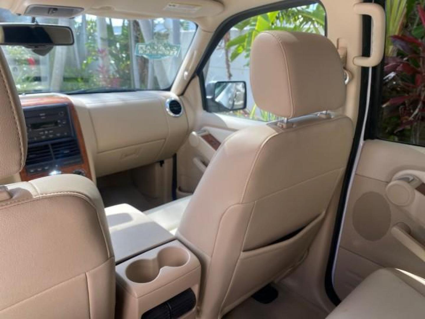 2006 Oxford White /Camel Ford Explorer Eddie Bauer 1 OWNER LOW MILES 88,841 (1FMEU64E56U) with an 4.0L SOHC V6 Engine engine, Automatic transmission, located at 4701 North Dixie Hwy, Pompano Beach, FL, 33064, (954) 422-2889, 26.240938, -80.123474 - OUR WEBPAGE FLORIDACARS1.COM HAS OVER 100 PHOTOS AND FREE CARFAX LINK 2006 FORD EXPLORER EDDIE BAUER VIN: 1FMEU64E56UA54894 1 F M E U 6 4 E 5 6 U A 5 4 8 9 4 4 DOOR WAGON/SPORT UTILITY 4.0L V6 F SOHC GASOLINE REAR WHEEL DRIVE Top Features Alloy Wheels Running Boards Leather Seats Sunroof(s) Parking - Photo#68