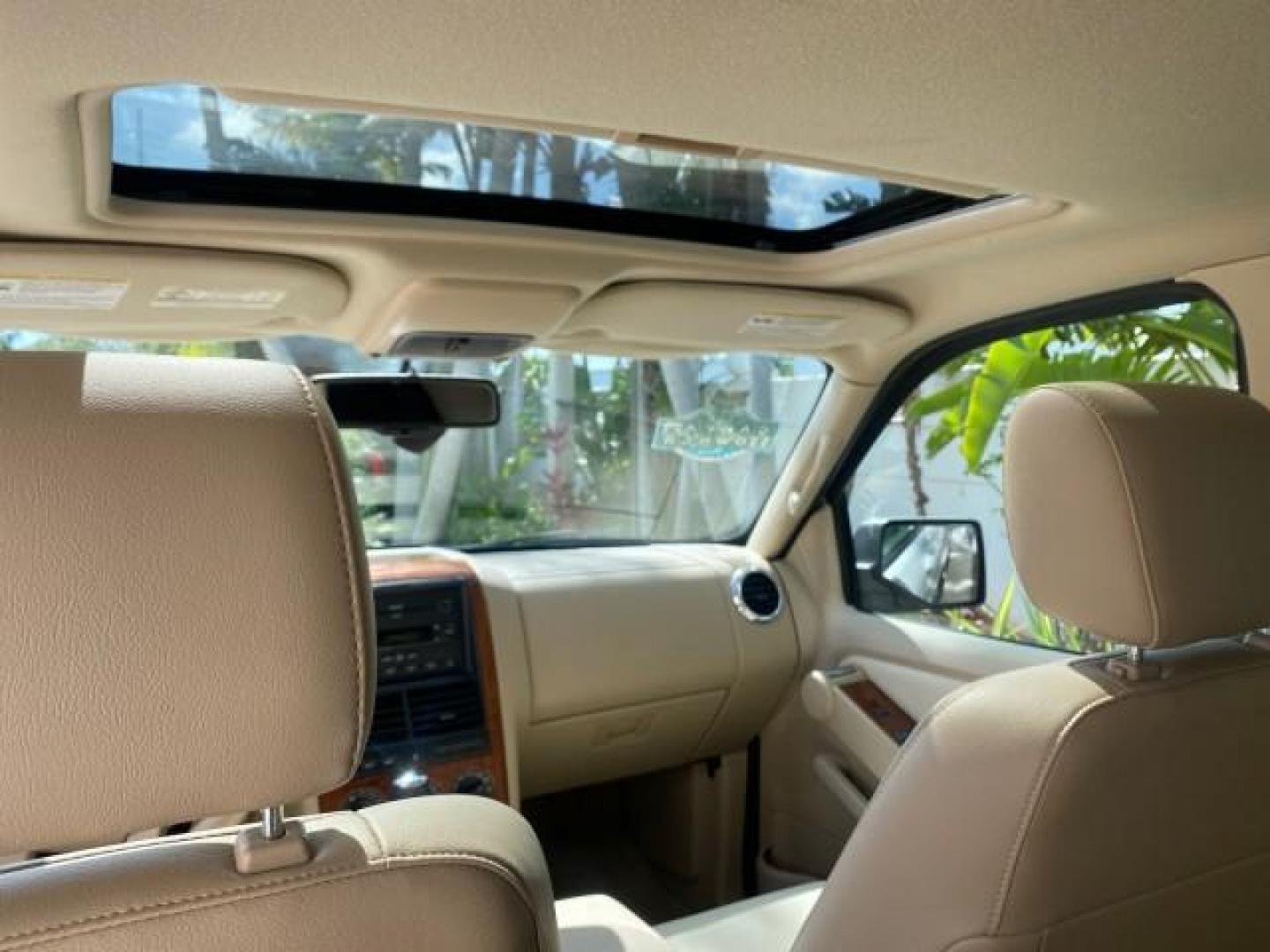 2006 Oxford White /Camel Ford Explorer Eddie Bauer 1 OWNER LOW MILES 88,841 (1FMEU64E56U) with an 4.0L SOHC V6 Engine engine, Automatic transmission, located at 4701 North Dixie Hwy, Pompano Beach, FL, 33064, (954) 422-2889, 26.240938, -80.123474 - OUR WEBPAGE FLORIDACARS1.COM HAS OVER 100 PHOTOS AND FREE CARFAX LINK 2006 FORD EXPLORER EDDIE BAUER VIN: 1FMEU64E56UA54894 1 F M E U 6 4 E 5 6 U A 5 4 8 9 4 4 DOOR WAGON/SPORT UTILITY 4.0L V6 F SOHC GASOLINE REAR WHEEL DRIVE Top Features Alloy Wheels Running Boards Leather Seats Sunroof(s) Parking - Photo#69