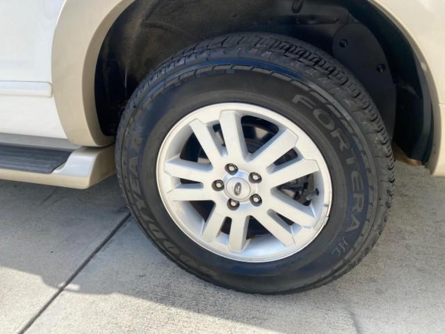 2006 Oxford White /Camel Ford Explorer Eddie Bauer 1 OWNER LOW MILES 88,841 (1FMEU64E56U) with an 4.0L SOHC V6 Engine engine, Automatic transmission, located at 4701 North Dixie Hwy, Pompano Beach, FL, 33064, (954) 422-2889, 26.240938, -80.123474 - OUR WEBPAGE FLORIDACARS1.COM HAS OVER 100 PHOTOS AND FREE CARFAX LINK 2006 FORD EXPLORER EDDIE BAUER VIN: 1FMEU64E56UA54894 1 F M E U 6 4 E 5 6 U A 5 4 8 9 4 4 DOOR WAGON/SPORT UTILITY 4.0L V6 F SOHC GASOLINE REAR WHEEL DRIVE Top Features Alloy Wheels Running Boards Leather Seats Sunroof(s) Parking - Photo#70