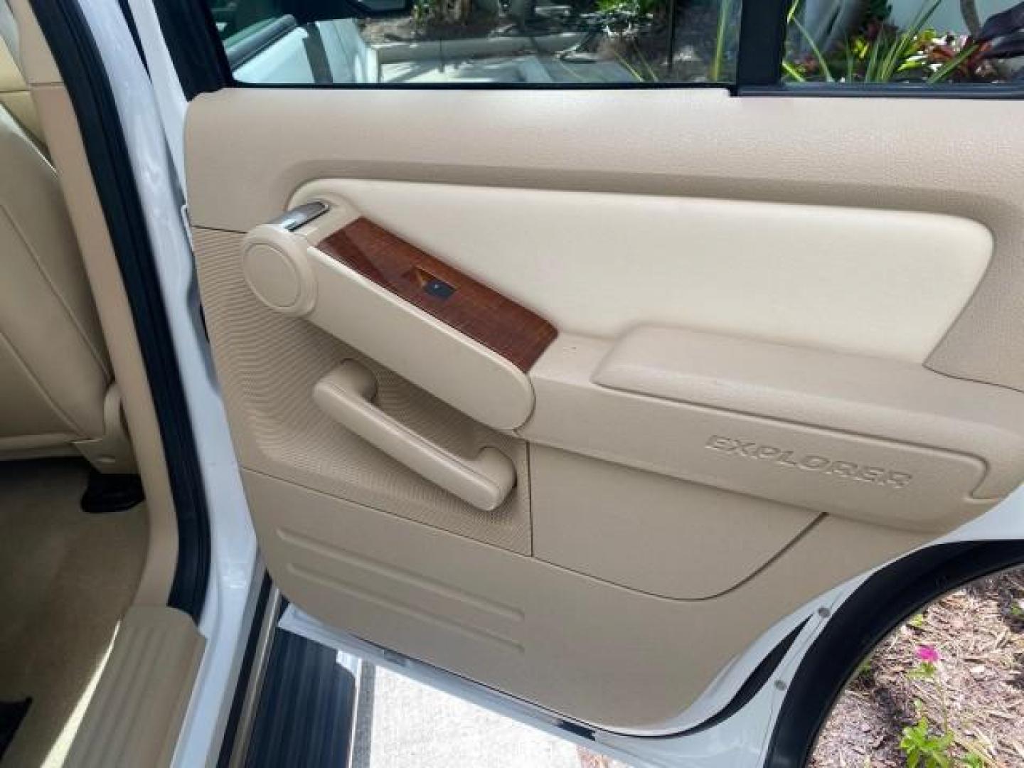 2006 Oxford White /Camel Ford Explorer Eddie Bauer 1 OWNER LOW MILES 88,841 (1FMEU64E56U) with an 4.0L SOHC V6 Engine engine, Automatic transmission, located at 4701 North Dixie Hwy, Pompano Beach, FL, 33064, (954) 422-2889, 26.240938, -80.123474 - OUR WEBPAGE FLORIDACARS1.COM HAS OVER 100 PHOTOS AND FREE CARFAX LINK 2006 FORD EXPLORER EDDIE BAUER VIN: 1FMEU64E56UA54894 1 F M E U 6 4 E 5 6 U A 5 4 8 9 4 4 DOOR WAGON/SPORT UTILITY 4.0L V6 F SOHC GASOLINE REAR WHEEL DRIVE Top Features Alloy Wheels Running Boards Leather Seats Sunroof(s) Parking - Photo#88