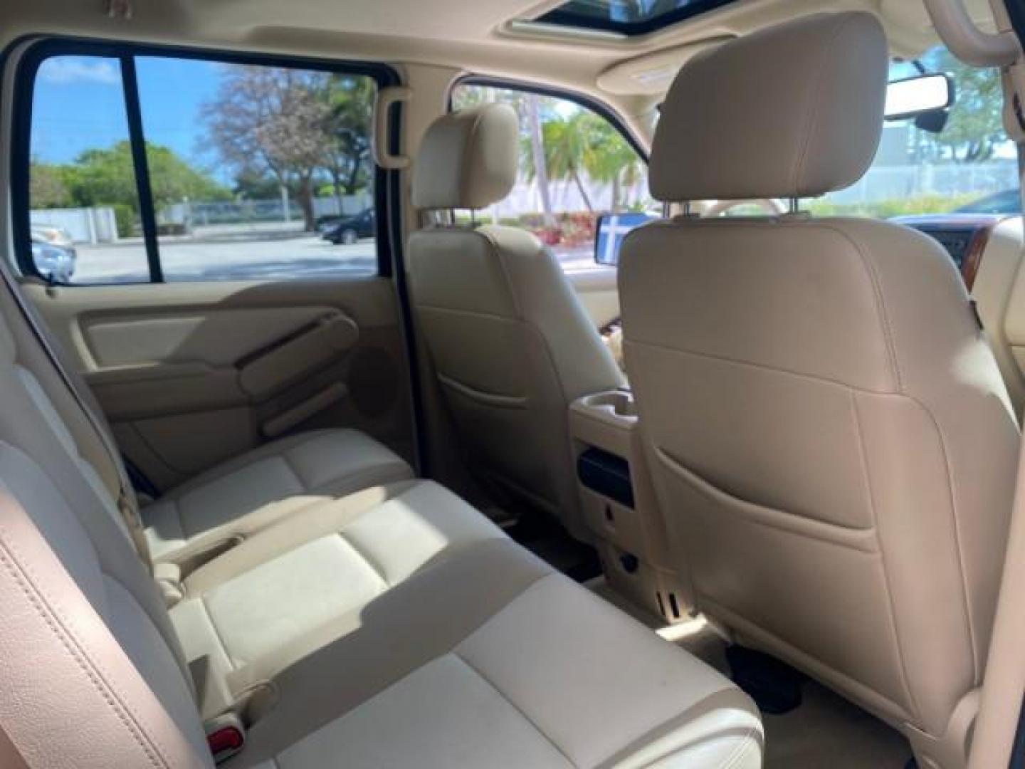 2006 Oxford White /Camel Ford Explorer Eddie Bauer 1 OWNER LOW MILES 88,841 (1FMEU64E56U) with an 4.0L SOHC V6 Engine engine, Automatic transmission, located at 4701 North Dixie Hwy, Pompano Beach, FL, 33064, (954) 422-2889, 26.240938, -80.123474 - OUR WEBPAGE FLORIDACARS1.COM HAS OVER 100 PHOTOS AND FREE CARFAX LINK 2006 FORD EXPLORER EDDIE BAUER VIN: 1FMEU64E56UA54894 1 F M E U 6 4 E 5 6 U A 5 4 8 9 4 4 DOOR WAGON/SPORT UTILITY 4.0L V6 F SOHC GASOLINE REAR WHEEL DRIVE Top Features Alloy Wheels Running Boards Leather Seats Sunroof(s) Parking - Photo#89