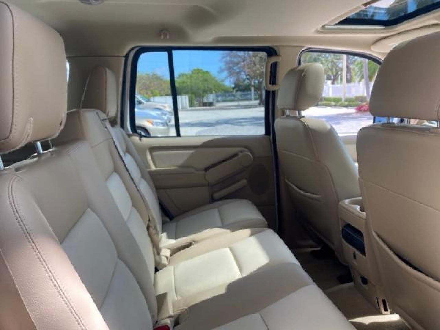 2006 Oxford White /Camel Ford Explorer Eddie Bauer 1 OWNER LOW MILES 88,841 (1FMEU64E56U) with an 4.0L SOHC V6 Engine engine, Automatic transmission, located at 4701 North Dixie Hwy, Pompano Beach, FL, 33064, (954) 422-2889, 26.240938, -80.123474 - OUR WEBPAGE FLORIDACARS1.COM HAS OVER 100 PHOTOS AND FREE CARFAX LINK 2006 FORD EXPLORER EDDIE BAUER VIN: 1FMEU64E56UA54894 1 F M E U 6 4 E 5 6 U A 5 4 8 9 4 4 DOOR WAGON/SPORT UTILITY 4.0L V6 F SOHC GASOLINE REAR WHEEL DRIVE Top Features Alloy Wheels Running Boards Leather Seats Sunroof(s) Parking - Photo#90