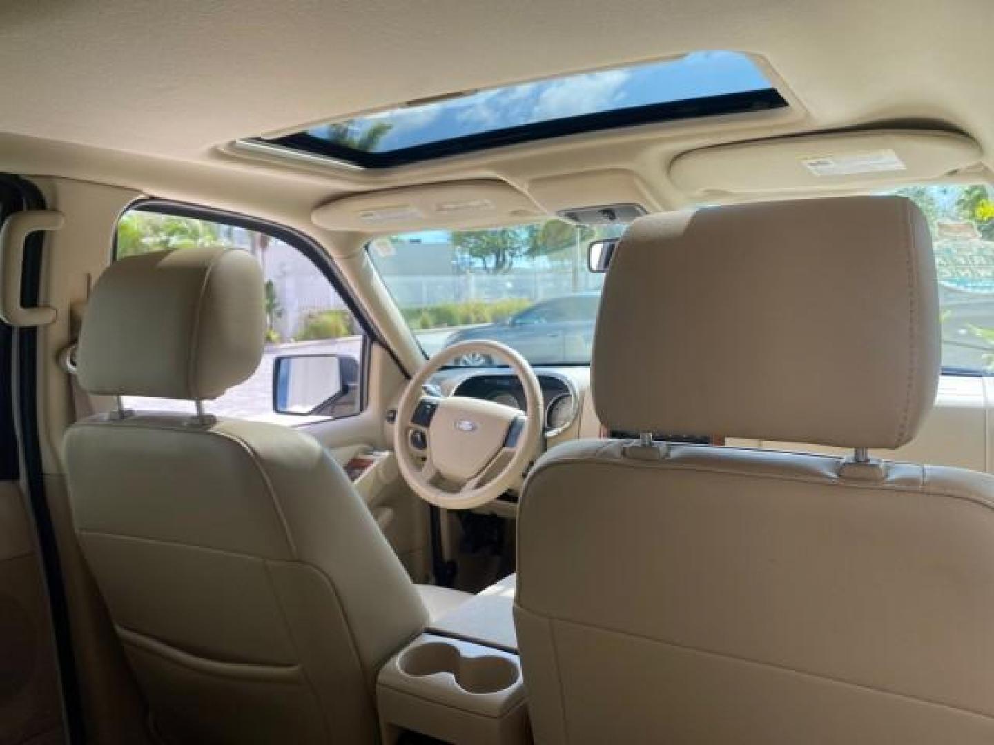 2006 Oxford White /Camel Ford Explorer Eddie Bauer 1 OWNER LOW MILES 88,841 (1FMEU64E56U) with an 4.0L SOHC V6 Engine engine, Automatic transmission, located at 4701 North Dixie Hwy, Pompano Beach, FL, 33064, (954) 422-2889, 26.240938, -80.123474 - OUR WEBPAGE FLORIDACARS1.COM HAS OVER 100 PHOTOS AND FREE CARFAX LINK 2006 FORD EXPLORER EDDIE BAUER VIN: 1FMEU64E56UA54894 1 F M E U 6 4 E 5 6 U A 5 4 8 9 4 4 DOOR WAGON/SPORT UTILITY 4.0L V6 F SOHC GASOLINE REAR WHEEL DRIVE Top Features Alloy Wheels Running Boards Leather Seats Sunroof(s) Parking - Photo#92