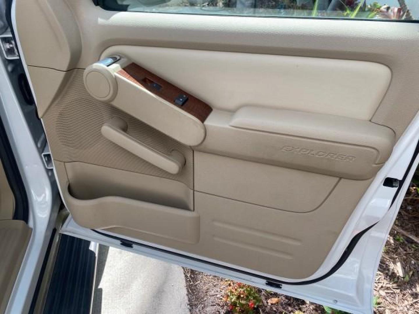 2006 Oxford White /Camel Ford Explorer Eddie Bauer 1 OWNER LOW MILES 88,841 (1FMEU64E56U) with an 4.0L SOHC V6 Engine engine, Automatic transmission, located at 4701 North Dixie Hwy, Pompano Beach, FL, 33064, (954) 422-2889, 26.240938, -80.123474 - OUR WEBPAGE FLORIDACARS1.COM HAS OVER 100 PHOTOS AND FREE CARFAX LINK 2006 FORD EXPLORER EDDIE BAUER VIN: 1FMEU64E56UA54894 1 F M E U 6 4 E 5 6 U A 5 4 8 9 4 4 DOOR WAGON/SPORT UTILITY 4.0L V6 F SOHC GASOLINE REAR WHEEL DRIVE Top Features Alloy Wheels Running Boards Leather Seats Sunroof(s) Parking - Photo#95