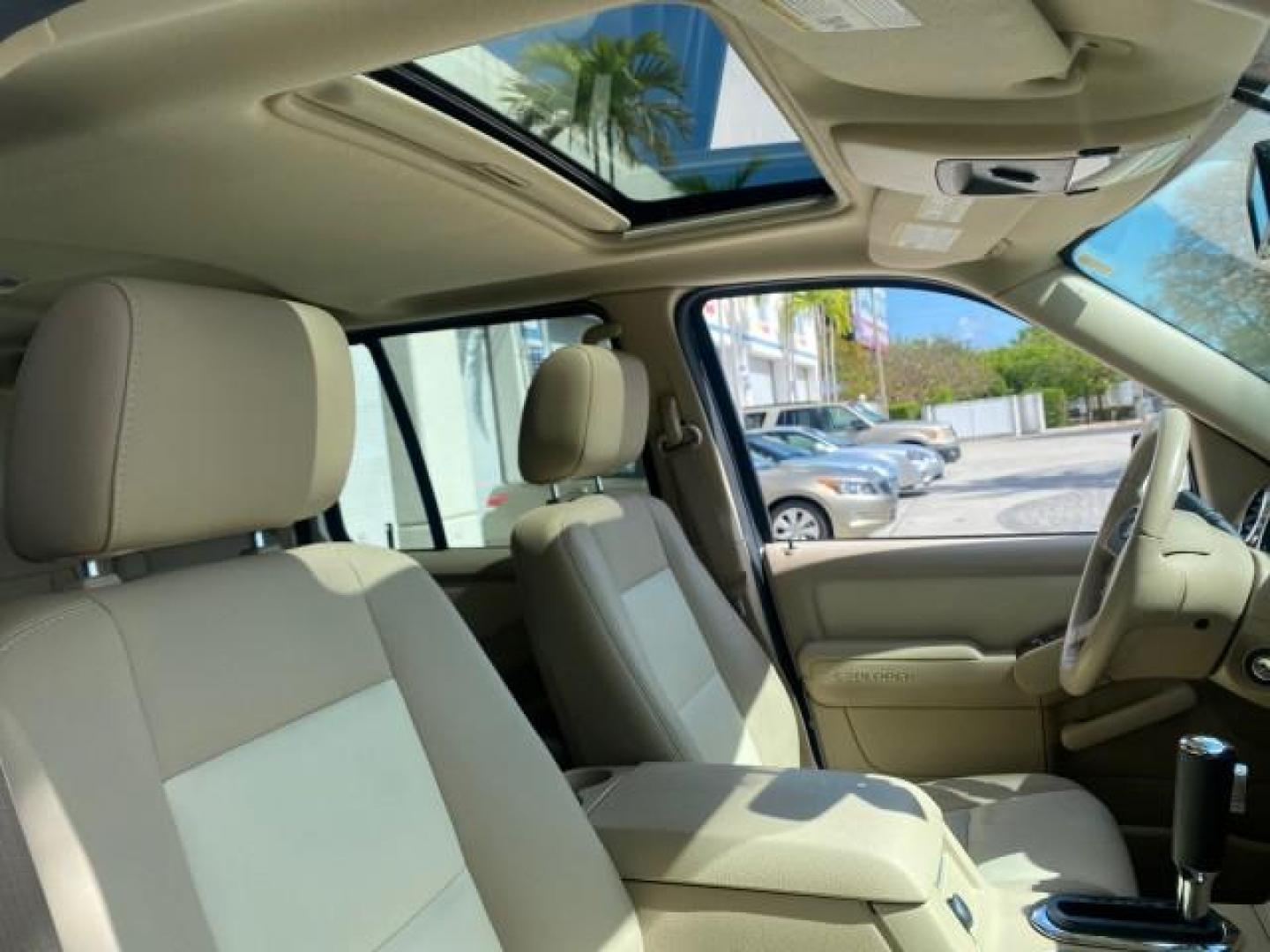 2006 Oxford White /Camel Ford Explorer Eddie Bauer 1 OWNER LOW MILES 88,841 (1FMEU64E56U) with an 4.0L SOHC V6 Engine engine, Automatic transmission, located at 4701 North Dixie Hwy, Pompano Beach, FL, 33064, (954) 422-2889, 26.240938, -80.123474 - OUR WEBPAGE FLORIDACARS1.COM HAS OVER 100 PHOTOS AND FREE CARFAX LINK 2006 FORD EXPLORER EDDIE BAUER VIN: 1FMEU64E56UA54894 1 F M E U 6 4 E 5 6 U A 5 4 8 9 4 4 DOOR WAGON/SPORT UTILITY 4.0L V6 F SOHC GASOLINE REAR WHEEL DRIVE Top Features Alloy Wheels Running Boards Leather Seats Sunroof(s) Parking - Photo#96