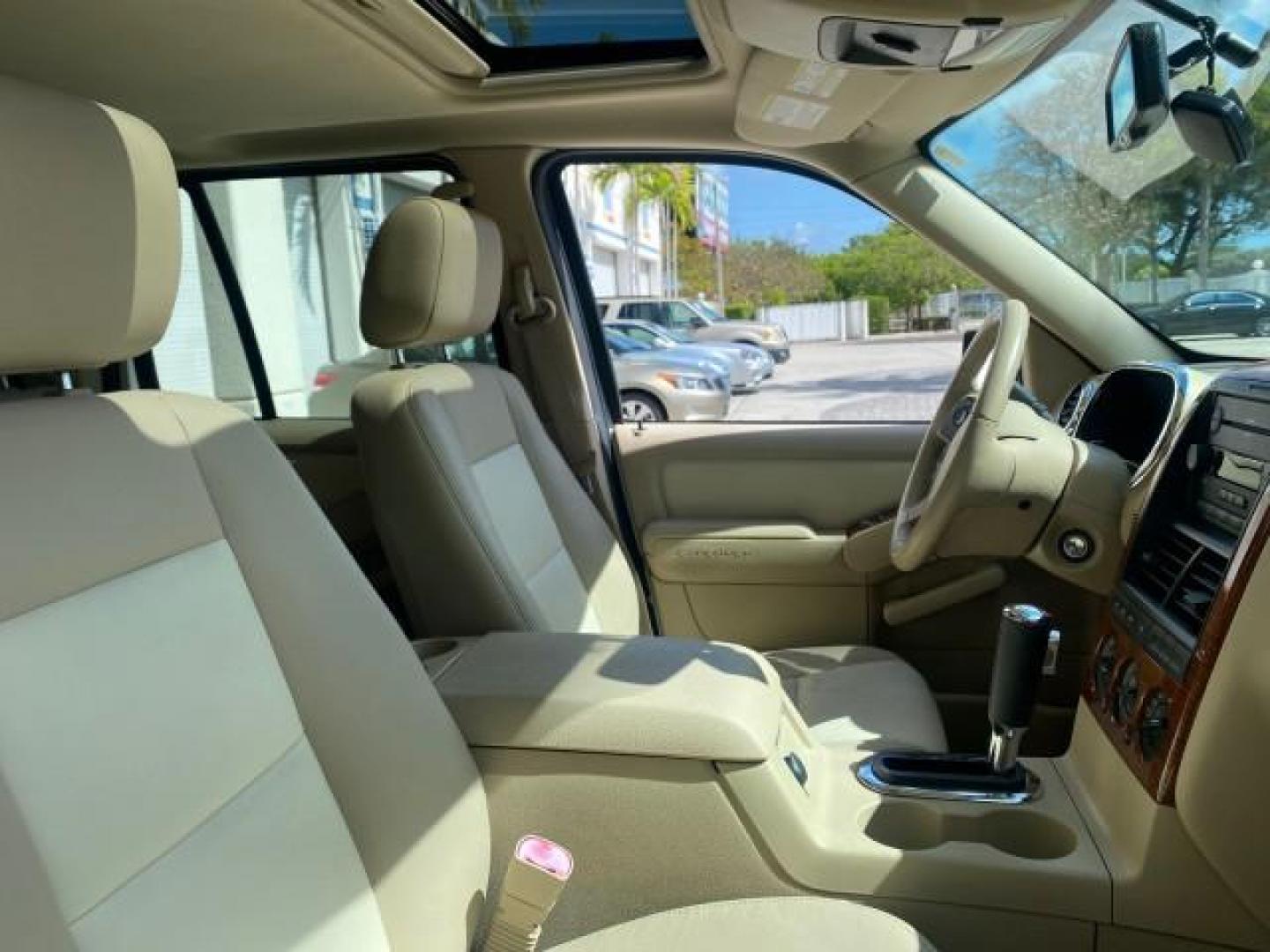 2006 Oxford White /Camel Ford Explorer Eddie Bauer 1 OWNER LOW MILES 88,841 (1FMEU64E56U) with an 4.0L SOHC V6 Engine engine, Automatic transmission, located at 4701 North Dixie Hwy, Pompano Beach, FL, 33064, (954) 422-2889, 26.240938, -80.123474 - OUR WEBPAGE FLORIDACARS1.COM HAS OVER 100 PHOTOS AND FREE CARFAX LINK 2006 FORD EXPLORER EDDIE BAUER VIN: 1FMEU64E56UA54894 1 F M E U 6 4 E 5 6 U A 5 4 8 9 4 4 DOOR WAGON/SPORT UTILITY 4.0L V6 F SOHC GASOLINE REAR WHEEL DRIVE Top Features Alloy Wheels Running Boards Leather Seats Sunroof(s) Parking - Photo#97