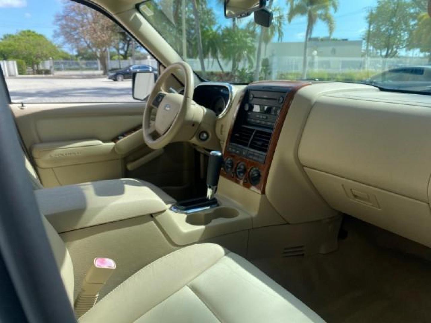 2006 Oxford White /Camel Ford Explorer Eddie Bauer 1 OWNER LOW MILES 88,841 (1FMEU64E56U) with an 4.0L SOHC V6 Engine engine, Automatic transmission, located at 4701 North Dixie Hwy, Pompano Beach, FL, 33064, (954) 422-2889, 26.240938, -80.123474 - OUR WEBPAGE FLORIDACARS1.COM HAS OVER 100 PHOTOS AND FREE CARFAX LINK 2006 FORD EXPLORER EDDIE BAUER VIN: 1FMEU64E56UA54894 1 F M E U 6 4 E 5 6 U A 5 4 8 9 4 4 DOOR WAGON/SPORT UTILITY 4.0L V6 F SOHC GASOLINE REAR WHEEL DRIVE Top Features Alloy Wheels Running Boards Leather Seats Sunroof(s) Parking - Photo#98