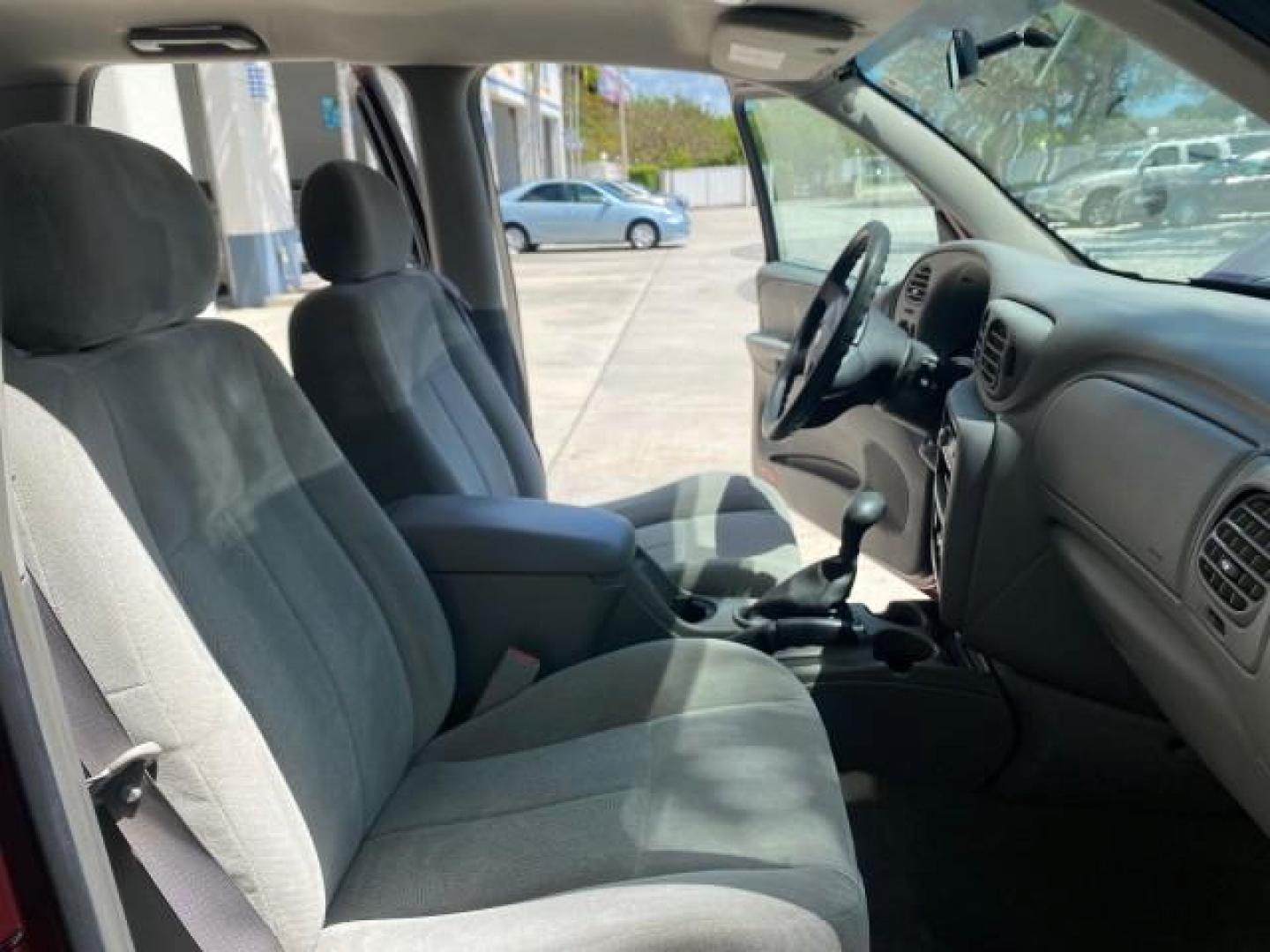 2005 Majestic Red Metallic /Light Gray Chevrolet TrailBlazer LS 39 SERVICES 1 OWNER (1GNDS13SX52) with an 4.2L Vortec 4200 SFI I6 Engine engine, Automatic transmission, located at 4701 North Dixie Hwy, Pompano Beach, FL, 33064, (954) 422-2889, 26.240938, -80.123474 - OUR WEBPAGE FLORIDACARS1.COM HAS OVER 100 PHOTOS AND FREE CARFAX LINK 2005 CHEVROLET TRAILBLAZER LS VIN: 1GNDS13SX52293455 1 G N D S 1 3 S X 5 2 2 9 3 4 5 5 4 DOOR WAGON/SPORT UTILITY 4.2L I6 F GASOLINE REAR WHEEL DRIVE TIRES LOOK NEW! Top Features Alloy Wheels Running Boards Cloth Seats Tow Hitch C - Photo#12