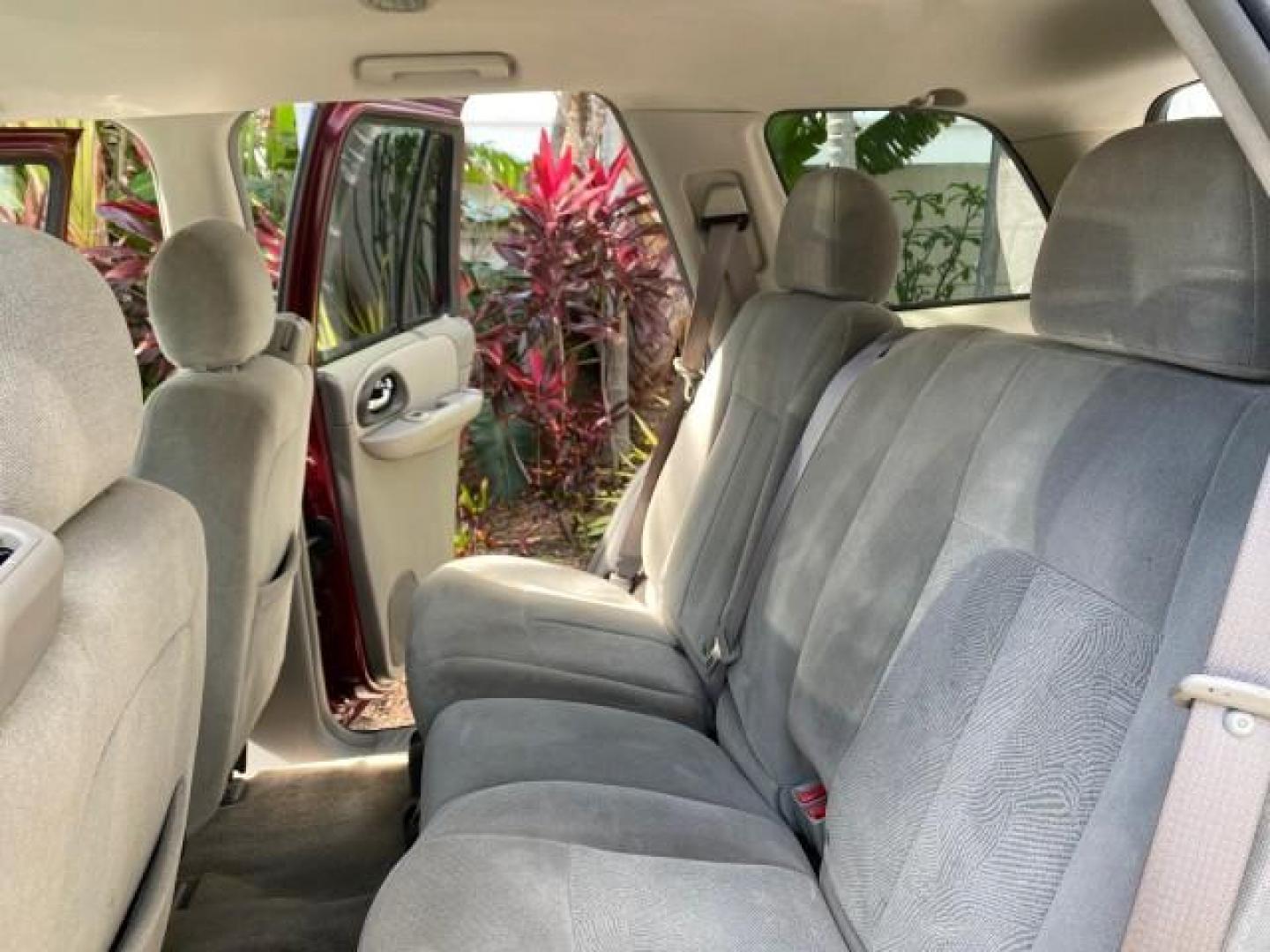2005 Majestic Red Metallic /Light Gray Chevrolet TrailBlazer LS 39 SERVICES 1 OWNER (1GNDS13SX52) with an 4.2L Vortec 4200 SFI I6 Engine engine, Automatic transmission, located at 4701 North Dixie Hwy, Pompano Beach, FL, 33064, (954) 422-2889, 26.240938, -80.123474 - OUR WEBPAGE FLORIDACARS1.COM HAS OVER 100 PHOTOS AND FREE CARFAX LINK 2005 CHEVROLET TRAILBLAZER LS VIN: 1GNDS13SX52293455 1 G N D S 1 3 S X 5 2 2 9 3 4 5 5 4 DOOR WAGON/SPORT UTILITY 4.2L I6 F GASOLINE REAR WHEEL DRIVE TIRES LOOK NEW! Top Features Alloy Wheels Running Boards Cloth Seats Tow Hitch C - Photo#14