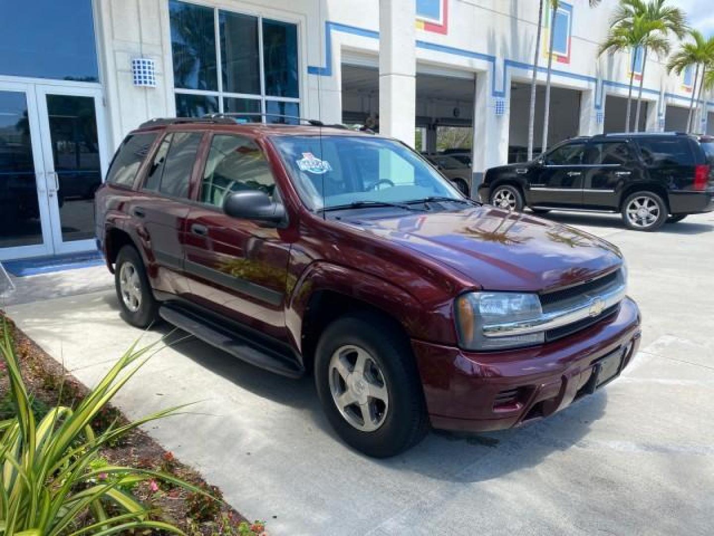 2005 Majestic Red Metallic /Light Gray Chevrolet TrailBlazer LS 39 SERVICES 1 OWNER (1GNDS13SX52) with an 4.2L Vortec 4200 SFI I6 Engine engine, Automatic transmission, located at 4701 North Dixie Hwy, Pompano Beach, FL, 33064, (954) 422-2889, 26.240938, -80.123474 - OUR WEBPAGE FLORIDACARS1.COM HAS OVER 100 PHOTOS AND FREE CARFAX LINK 2005 CHEVROLET TRAILBLAZER LS VIN: 1GNDS13SX52293455 1 G N D S 1 3 S X 5 2 2 9 3 4 5 5 4 DOOR WAGON/SPORT UTILITY 4.2L I6 F GASOLINE REAR WHEEL DRIVE TIRES LOOK NEW! Top Features Alloy Wheels Running Boards Cloth Seats Tow Hitch C - Photo#24