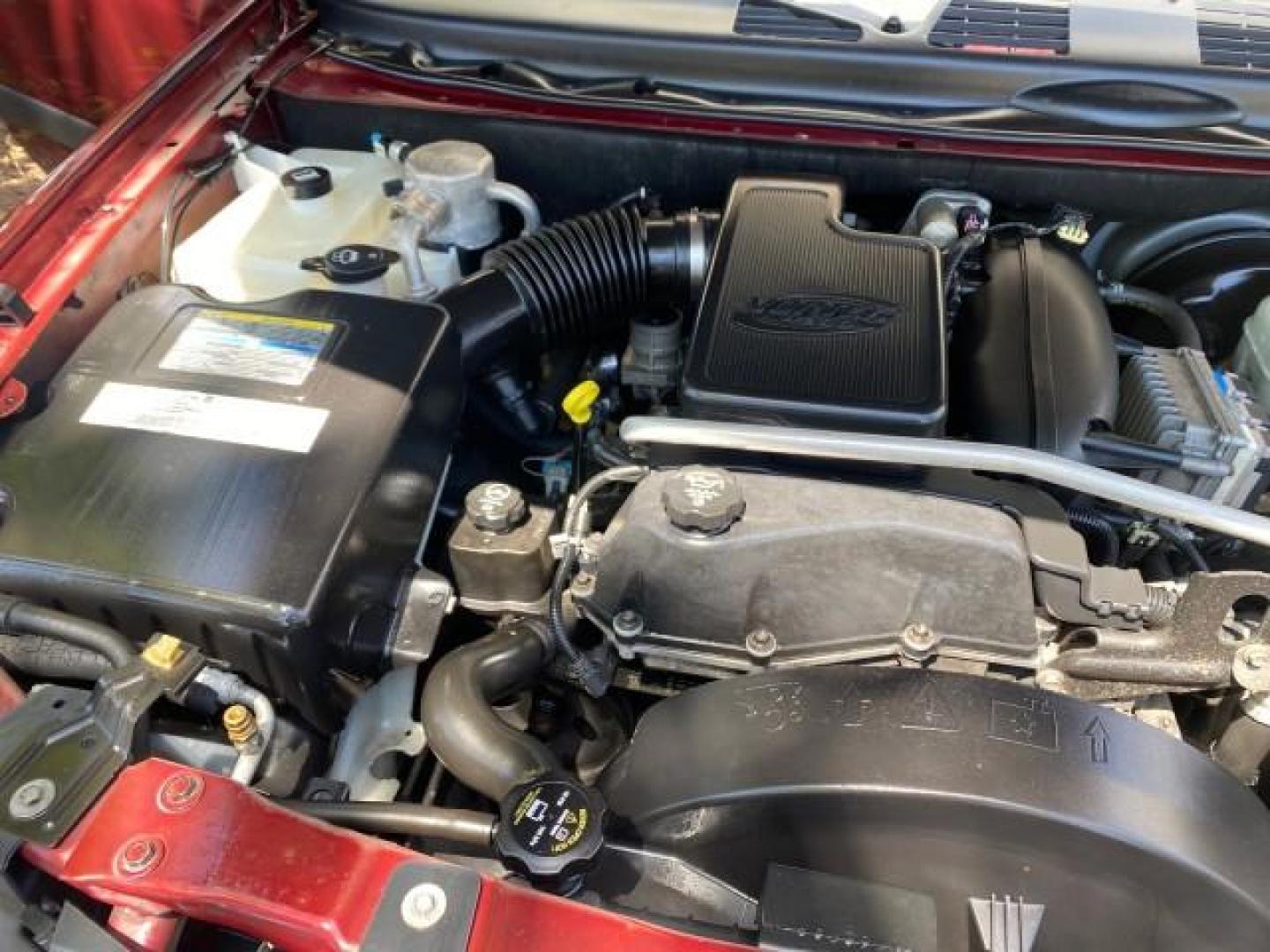 2005 Majestic Red Metallic /Light Gray Chevrolet TrailBlazer LS 39 SERVICES 1 OWNER (1GNDS13SX52) with an 4.2L Vortec 4200 SFI I6 Engine engine, Automatic transmission, located at 4701 North Dixie Hwy, Pompano Beach, FL, 33064, (954) 422-2889, 26.240938, -80.123474 - OUR WEBPAGE FLORIDACARS1.COM HAS OVER 100 PHOTOS AND FREE CARFAX LINK 2005 CHEVROLET TRAILBLAZER LS VIN: 1GNDS13SX52293455 1 G N D S 1 3 S X 5 2 2 9 3 4 5 5 4 DOOR WAGON/SPORT UTILITY 4.2L I6 F GASOLINE REAR WHEEL DRIVE TIRES LOOK NEW! Top Features Alloy Wheels Running Boards Cloth Seats Tow Hitch C - Photo#25