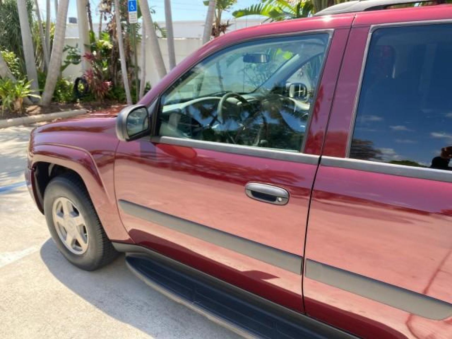 2005 Majestic Red Metallic /Light Gray Chevrolet TrailBlazer LS 39 SERVICES 1 OWNER (1GNDS13SX52) with an 4.2L Vortec 4200 SFI I6 Engine engine, Automatic transmission, located at 4701 North Dixie Hwy, Pompano Beach, FL, 33064, (954) 422-2889, 26.240938, -80.123474 - OUR WEBPAGE FLORIDACARS1.COM HAS OVER 100 PHOTOS AND FREE CARFAX LINK 2005 CHEVROLET TRAILBLAZER LS VIN: 1GNDS13SX52293455 1 G N D S 1 3 S X 5 2 2 9 3 4 5 5 4 DOOR WAGON/SPORT UTILITY 4.2L I6 F GASOLINE REAR WHEEL DRIVE TIRES LOOK NEW! Top Features Alloy Wheels Running Boards Cloth Seats Tow Hitch C - Photo#27