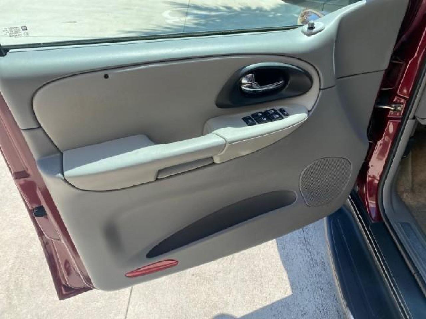 2005 Majestic Red Metallic /Light Gray Chevrolet TrailBlazer LS 39 SERVICES 1 OWNER (1GNDS13SX52) with an 4.2L Vortec 4200 SFI I6 Engine engine, Automatic transmission, located at 4701 North Dixie Hwy, Pompano Beach, FL, 33064, (954) 422-2889, 26.240938, -80.123474 - OUR WEBPAGE FLORIDACARS1.COM HAS OVER 100 PHOTOS AND FREE CARFAX LINK 2005 CHEVROLET TRAILBLAZER LS VIN: 1GNDS13SX52293455 1 G N D S 1 3 S X 5 2 2 9 3 4 5 5 4 DOOR WAGON/SPORT UTILITY 4.2L I6 F GASOLINE REAR WHEEL DRIVE TIRES LOOK NEW! Top Features Alloy Wheels Running Boards Cloth Seats Tow Hitch C - Photo#32