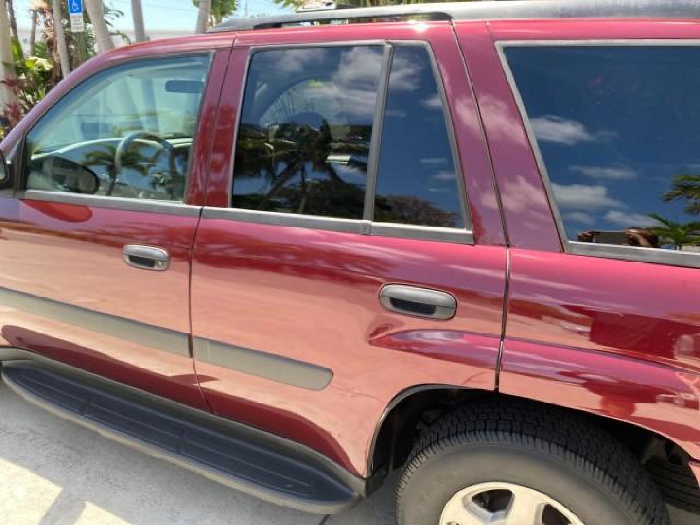 2005 Majestic Red Metallic /Light Gray Chevrolet TrailBlazer LS 39 SERVICES 1 OWNER (1GNDS13SX52) with an 4.2L Vortec 4200 SFI I6 Engine engine, Automatic transmission, located at 4701 North Dixie Hwy, Pompano Beach, FL, 33064, (954) 422-2889, 26.240938, -80.123474 - OUR WEBPAGE FLORIDACARS1.COM HAS OVER 100 PHOTOS AND FREE CARFAX LINK 2005 CHEVROLET TRAILBLAZER LS VIN: 1GNDS13SX52293455 1 G N D S 1 3 S X 5 2 2 9 3 4 5 5 4 DOOR WAGON/SPORT UTILITY 4.2L I6 F GASOLINE REAR WHEEL DRIVE TIRES LOOK NEW! Top Features Alloy Wheels Running Boards Cloth Seats Tow Hitch C - Photo#60