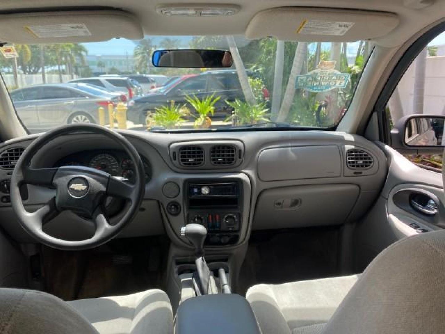 2005 Majestic Red Metallic /Light Gray Chevrolet TrailBlazer LS 39 SERVICES 1 OWNER (1GNDS13SX52) with an 4.2L Vortec 4200 SFI I6 Engine engine, Automatic transmission, located at 4701 North Dixie Hwy, Pompano Beach, FL, 33064, (954) 422-2889, 26.240938, -80.123474 - OUR WEBPAGE FLORIDACARS1.COM HAS OVER 100 PHOTOS AND FREE CARFAX LINK 2005 CHEVROLET TRAILBLAZER LS VIN: 1GNDS13SX52293455 1 G N D S 1 3 S X 5 2 2 9 3 4 5 5 4 DOOR WAGON/SPORT UTILITY 4.2L I6 F GASOLINE REAR WHEEL DRIVE TIRES LOOK NEW! Top Features Alloy Wheels Running Boards Cloth Seats Tow Hitch C - Photo#67