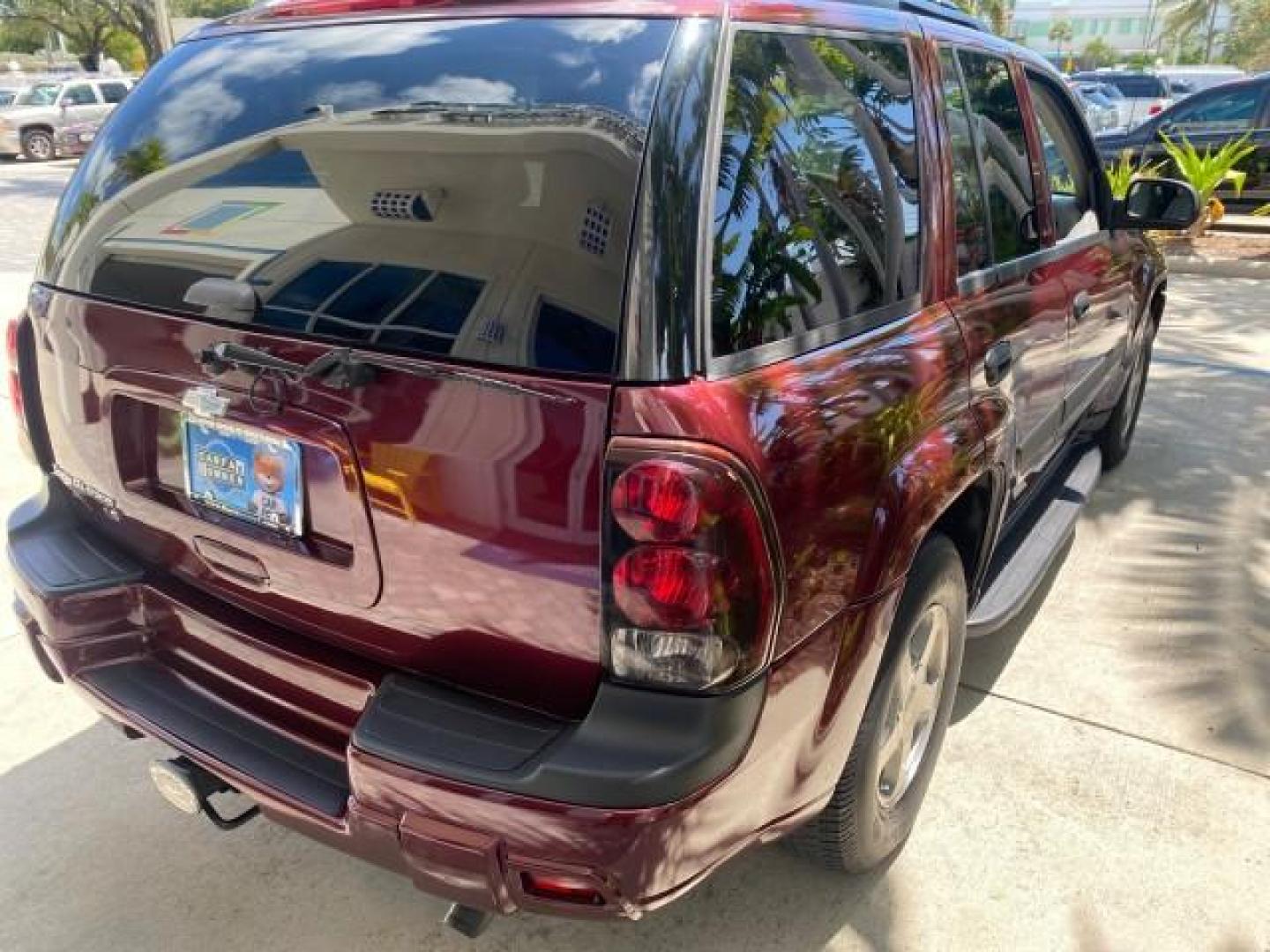 2005 Majestic Red Metallic /Light Gray Chevrolet TrailBlazer LS 39 SERVICES 1 OWNER (1GNDS13SX52) with an 4.2L Vortec 4200 SFI I6 Engine engine, Automatic transmission, located at 4701 North Dixie Hwy, Pompano Beach, FL, 33064, (954) 422-2889, 26.240938, -80.123474 - OUR WEBPAGE FLORIDACARS1.COM HAS OVER 100 PHOTOS AND FREE CARFAX LINK 2005 CHEVROLET TRAILBLAZER LS VIN: 1GNDS13SX52293455 1 G N D S 1 3 S X 5 2 2 9 3 4 5 5 4 DOOR WAGON/SPORT UTILITY 4.2L I6 F GASOLINE REAR WHEEL DRIVE TIRES LOOK NEW! Top Features Alloy Wheels Running Boards Cloth Seats Tow Hitch C - Photo#75