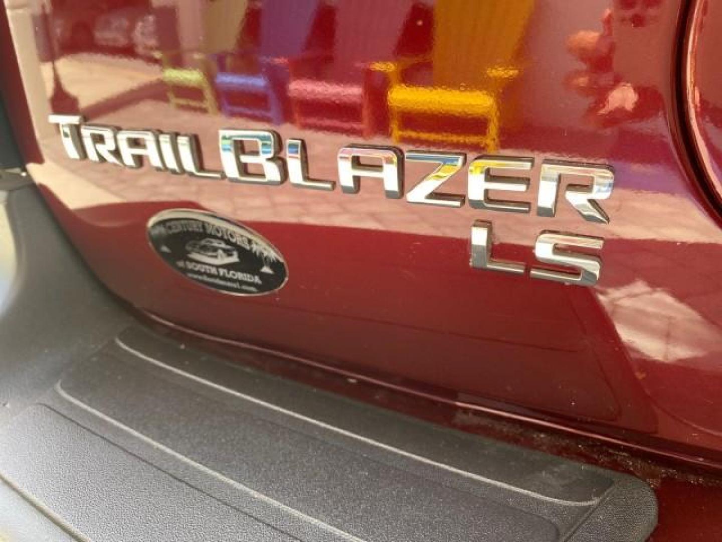 2005 Majestic Red Metallic /Light Gray Chevrolet TrailBlazer LS 39 SERVICES 1 OWNER (1GNDS13SX52) with an 4.2L Vortec 4200 SFI I6 Engine engine, Automatic transmission, located at 4701 North Dixie Hwy, Pompano Beach, FL, 33064, (954) 422-2889, 26.240938, -80.123474 - OUR WEBPAGE FLORIDACARS1.COM HAS OVER 100 PHOTOS AND FREE CARFAX LINK 2005 CHEVROLET TRAILBLAZER LS VIN: 1GNDS13SX52293455 1 G N D S 1 3 S X 5 2 2 9 3 4 5 5 4 DOOR WAGON/SPORT UTILITY 4.2L I6 F GASOLINE REAR WHEEL DRIVE TIRES LOOK NEW! Top Features Alloy Wheels Running Boards Cloth Seats Tow Hitch C - Photo#76