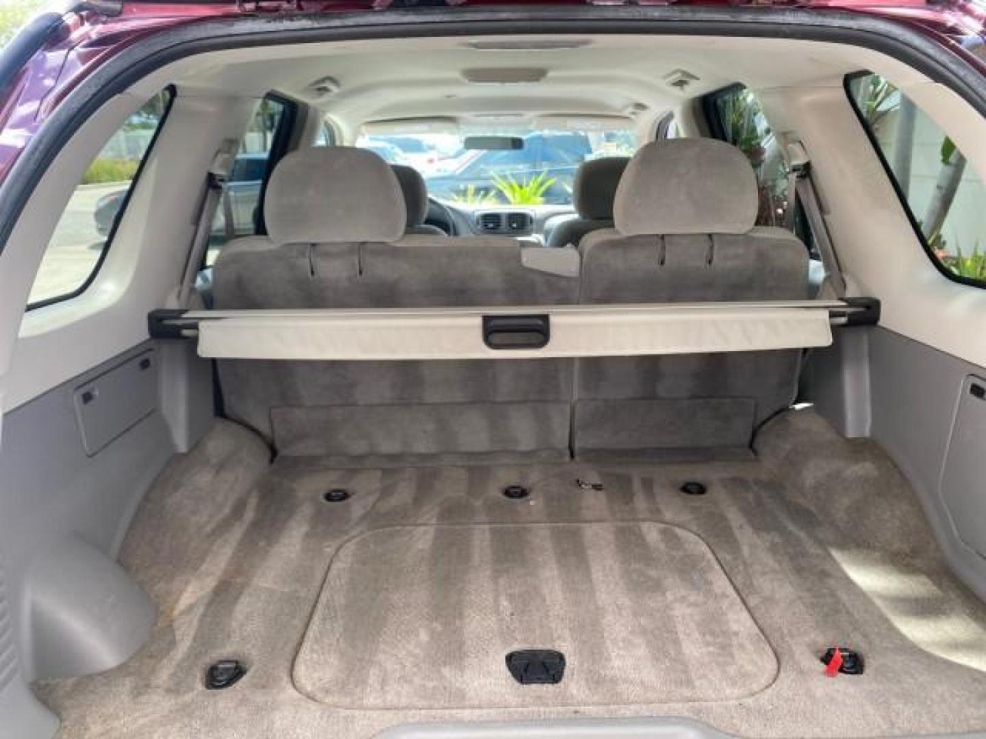 2005 Majestic Red Metallic /Light Gray Chevrolet TrailBlazer LS 39 SERVICES 1 OWNER (1GNDS13SX52) with an 4.2L Vortec 4200 SFI I6 Engine engine, Automatic transmission, located at 4701 North Dixie Hwy, Pompano Beach, FL, 33064, (954) 422-2889, 26.240938, -80.123474 - OUR WEBPAGE FLORIDACARS1.COM HAS OVER 100 PHOTOS AND FREE CARFAX LINK 2005 CHEVROLET TRAILBLAZER LS VIN: 1GNDS13SX52293455 1 G N D S 1 3 S X 5 2 2 9 3 4 5 5 4 DOOR WAGON/SPORT UTILITY 4.2L I6 F GASOLINE REAR WHEEL DRIVE TIRES LOOK NEW! Top Features Alloy Wheels Running Boards Cloth Seats Tow Hitch C - Photo#80