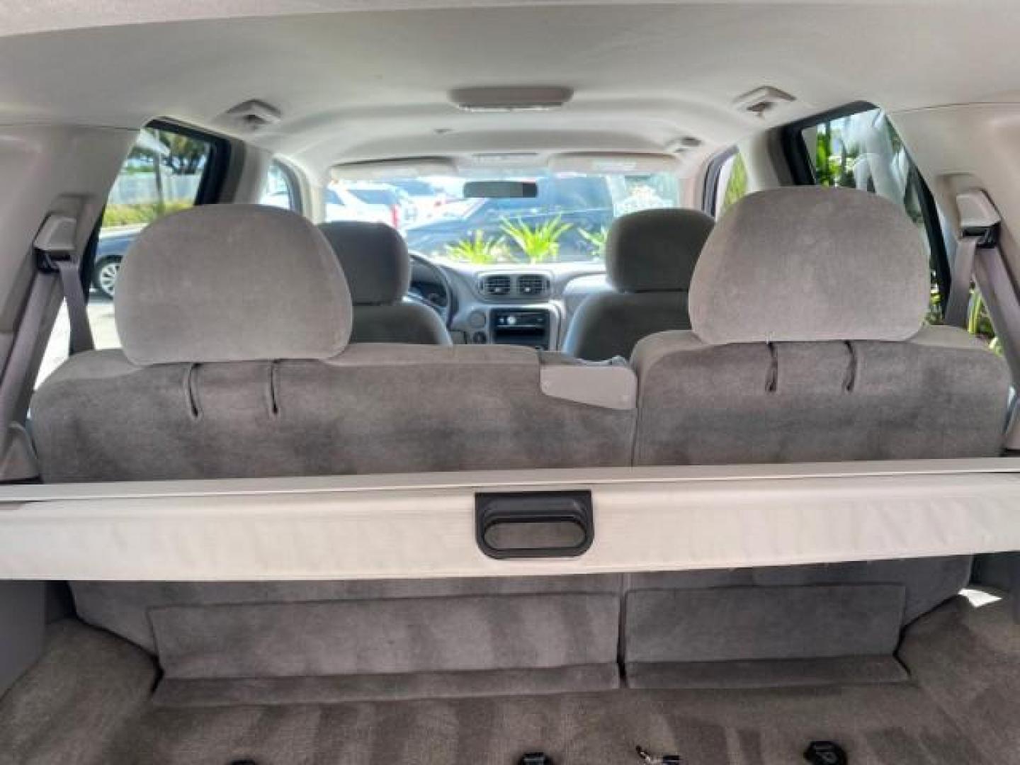 2005 Majestic Red Metallic /Light Gray Chevrolet TrailBlazer LS 39 SERVICES 1 OWNER (1GNDS13SX52) with an 4.2L Vortec 4200 SFI I6 Engine engine, Automatic transmission, located at 4701 North Dixie Hwy, Pompano Beach, FL, 33064, (954) 422-2889, 26.240938, -80.123474 - OUR WEBPAGE FLORIDACARS1.COM HAS OVER 100 PHOTOS AND FREE CARFAX LINK 2005 CHEVROLET TRAILBLAZER LS VIN: 1GNDS13SX52293455 1 G N D S 1 3 S X 5 2 2 9 3 4 5 5 4 DOOR WAGON/SPORT UTILITY 4.2L I6 F GASOLINE REAR WHEEL DRIVE TIRES LOOK NEW! Top Features Alloy Wheels Running Boards Cloth Seats Tow Hitch C - Photo#81