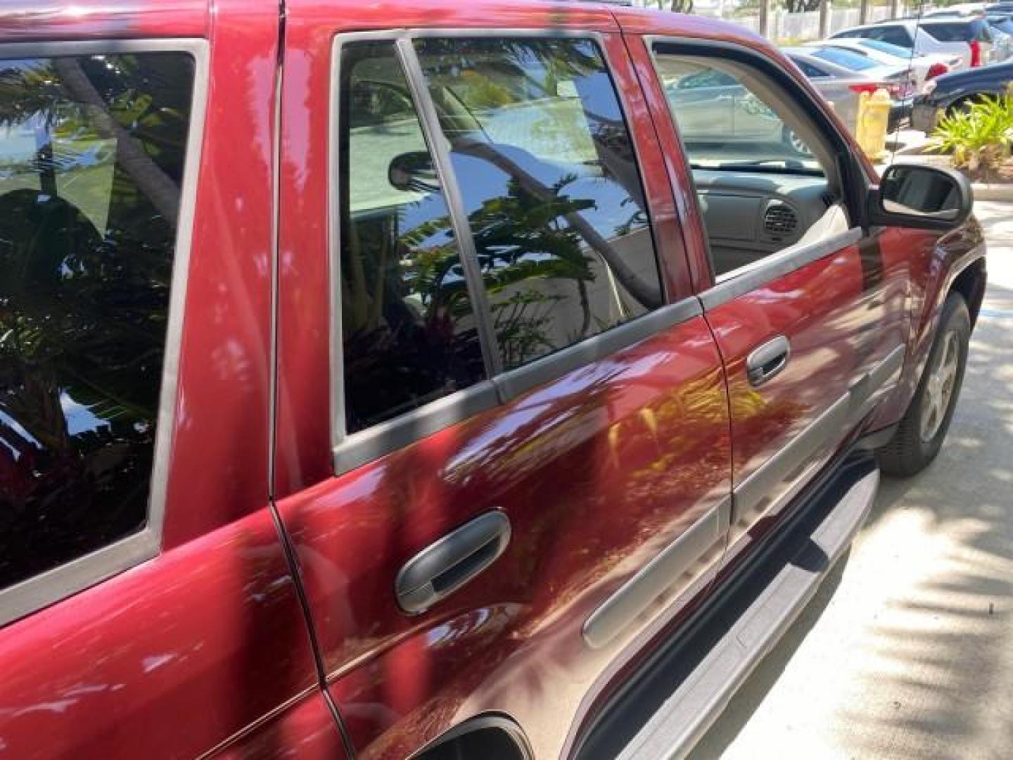 2005 Majestic Red Metallic /Light Gray Chevrolet TrailBlazer LS 39 SERVICES 1 OWNER (1GNDS13SX52) with an 4.2L Vortec 4200 SFI I6 Engine engine, Automatic transmission, located at 4701 North Dixie Hwy, Pompano Beach, FL, 33064, (954) 422-2889, 26.240938, -80.123474 - OUR WEBPAGE FLORIDACARS1.COM HAS OVER 100 PHOTOS AND FREE CARFAX LINK 2005 CHEVROLET TRAILBLAZER LS VIN: 1GNDS13SX52293455 1 G N D S 1 3 S X 5 2 2 9 3 4 5 5 4 DOOR WAGON/SPORT UTILITY 4.2L I6 F GASOLINE REAR WHEEL DRIVE TIRES LOOK NEW! Top Features Alloy Wheels Running Boards Cloth Seats Tow Hitch C - Photo#86