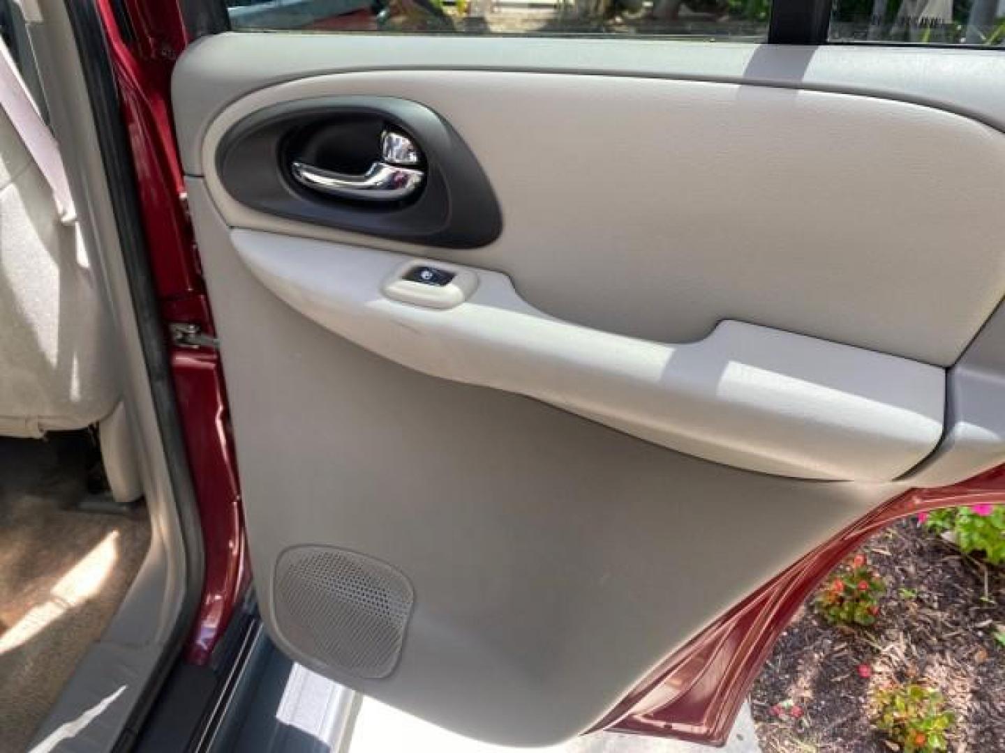 2005 Majestic Red Metallic /Light Gray Chevrolet TrailBlazer LS 39 SERVICES 1 OWNER (1GNDS13SX52) with an 4.2L Vortec 4200 SFI I6 Engine engine, Automatic transmission, located at 4701 North Dixie Hwy, Pompano Beach, FL, 33064, (954) 422-2889, 26.240938, -80.123474 - OUR WEBPAGE FLORIDACARS1.COM HAS OVER 100 PHOTOS AND FREE CARFAX LINK 2005 CHEVROLET TRAILBLAZER LS VIN: 1GNDS13SX52293455 1 G N D S 1 3 S X 5 2 2 9 3 4 5 5 4 DOOR WAGON/SPORT UTILITY 4.2L I6 F GASOLINE REAR WHEEL DRIVE TIRES LOOK NEW! Top Features Alloy Wheels Running Boards Cloth Seats Tow Hitch C - Photo#88