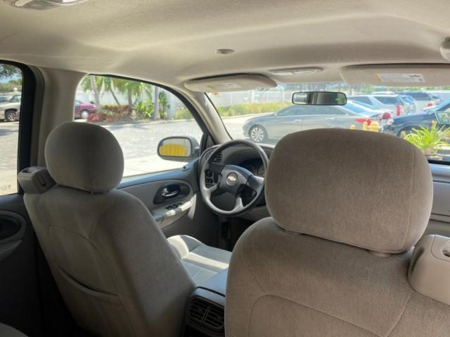 2005 Majestic Red Metallic /Light Gray Chevrolet TrailBlazer LS 39 SERVICES 1 OWNER (1GNDS13SX52) with an 4.2L Vortec 4200 SFI I6 Engine engine, Automatic transmission, located at 4701 North Dixie Hwy, Pompano Beach, FL, 33064, (954) 422-2889, 26.240938, -80.123474 - OUR WEBPAGE FLORIDACARS1.COM HAS OVER 100 PHOTOS AND FREE CARFAX LINK 2005 CHEVROLET TRAILBLAZER LS VIN: 1GNDS13SX52293455 1 G N D S 1 3 S X 5 2 2 9 3 4 5 5 4 DOOR WAGON/SPORT UTILITY 4.2L I6 F GASOLINE REAR WHEEL DRIVE TIRES LOOK NEW! Top Features Alloy Wheels Running Boards Cloth Seats Tow Hitch C - Photo#91